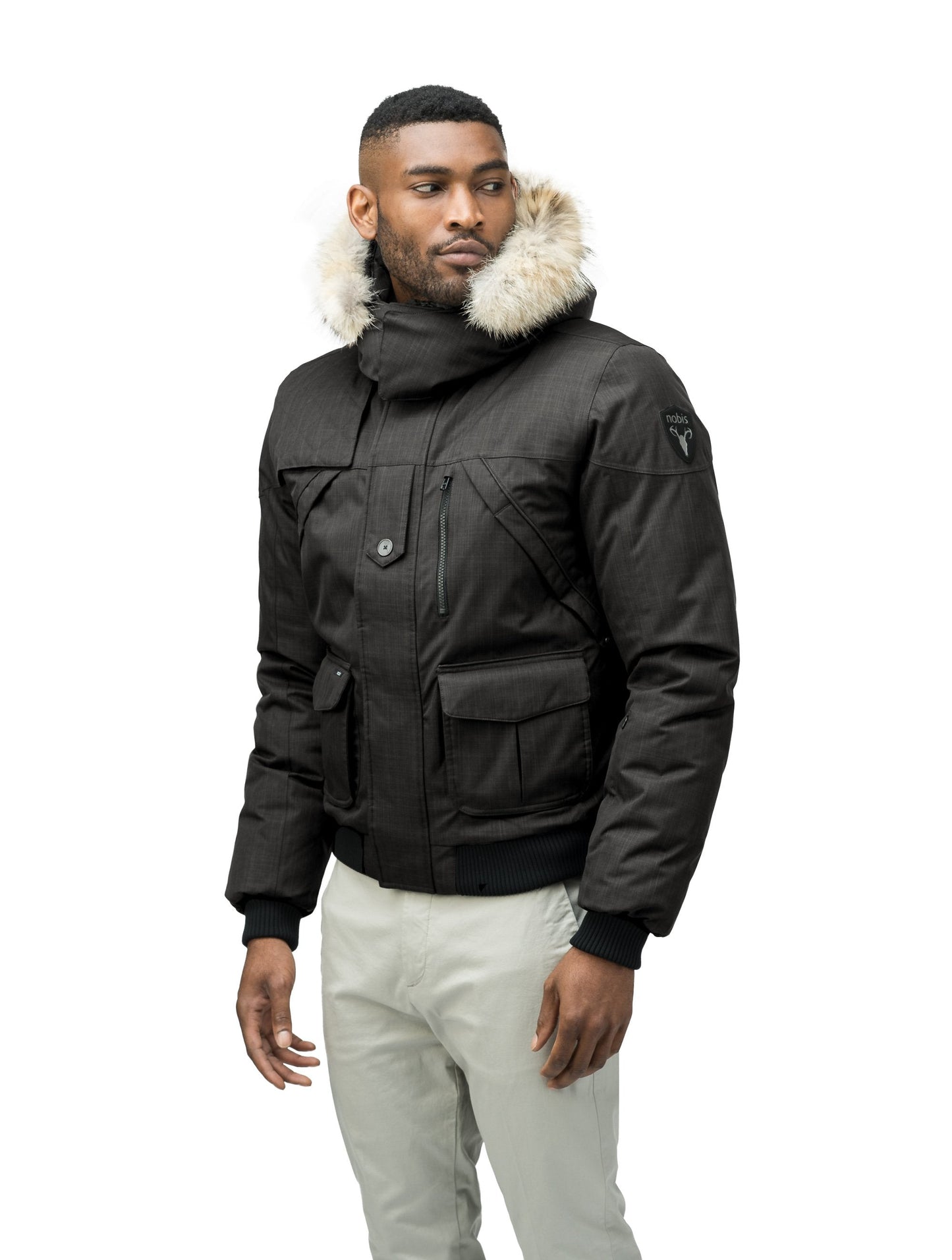 Men's classic down bomber with two patch pockets and a right shoulder storm flap in CH Black