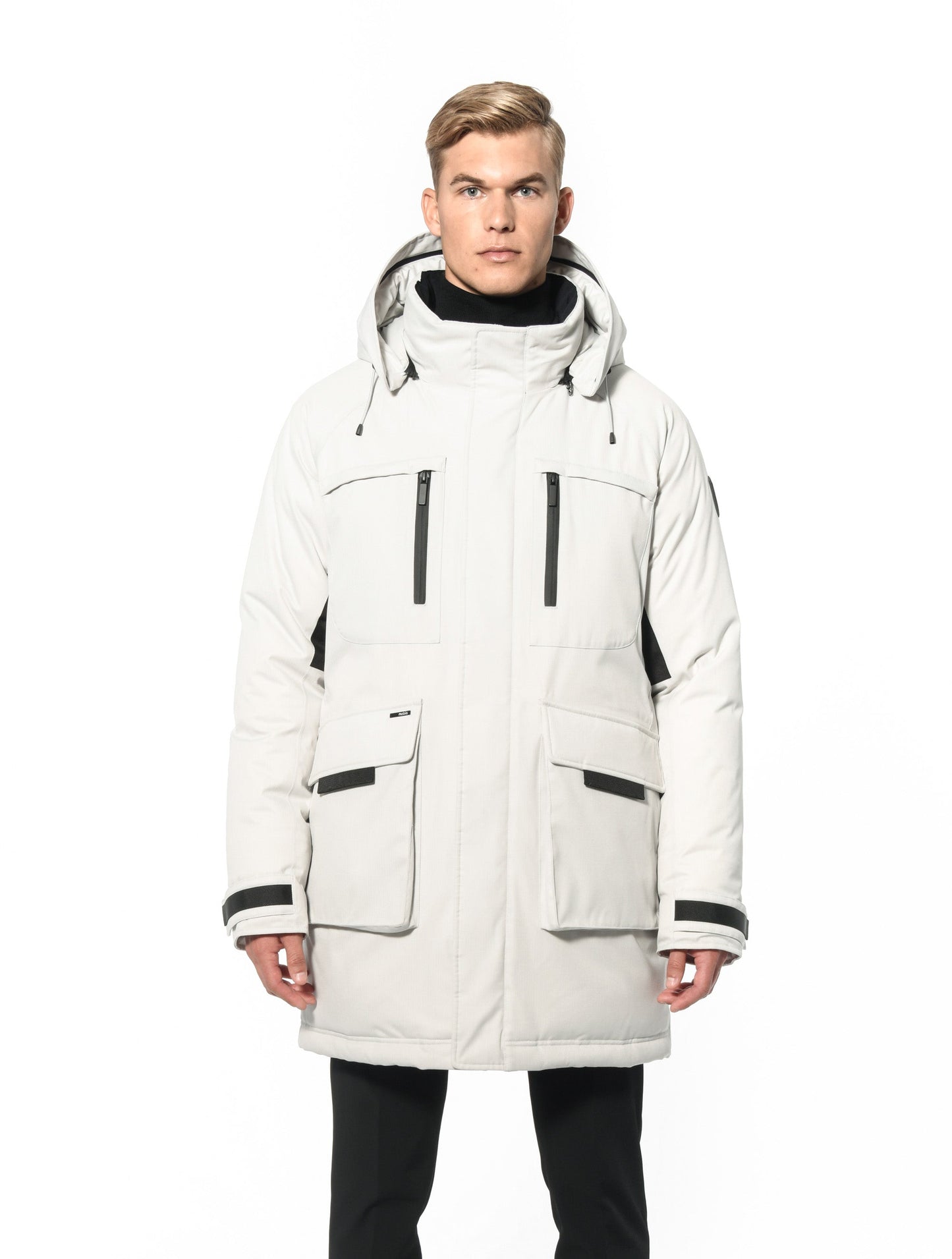 Men's thigh length down-filled parka with removable hood and removable coyote fur trim in Chalk