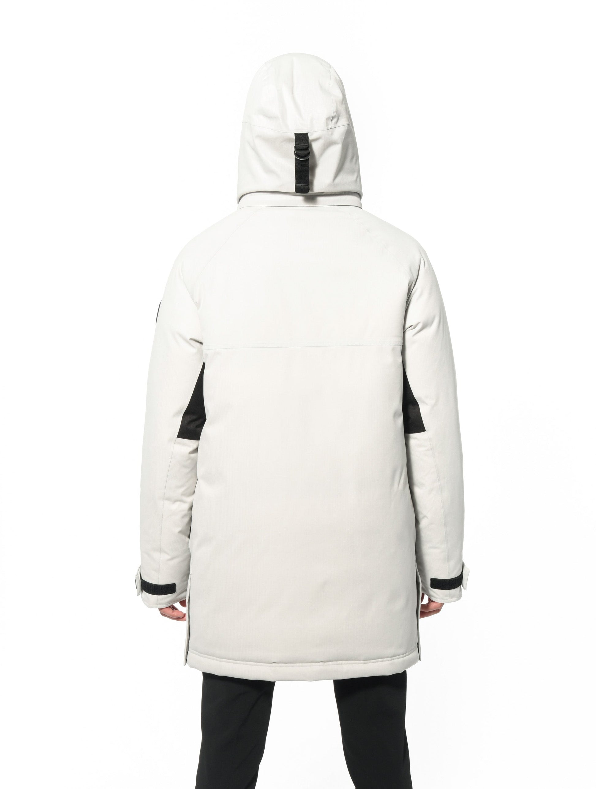 Men's thigh length down-filled parka with removable hood and removable coyote fur trim in Chalk