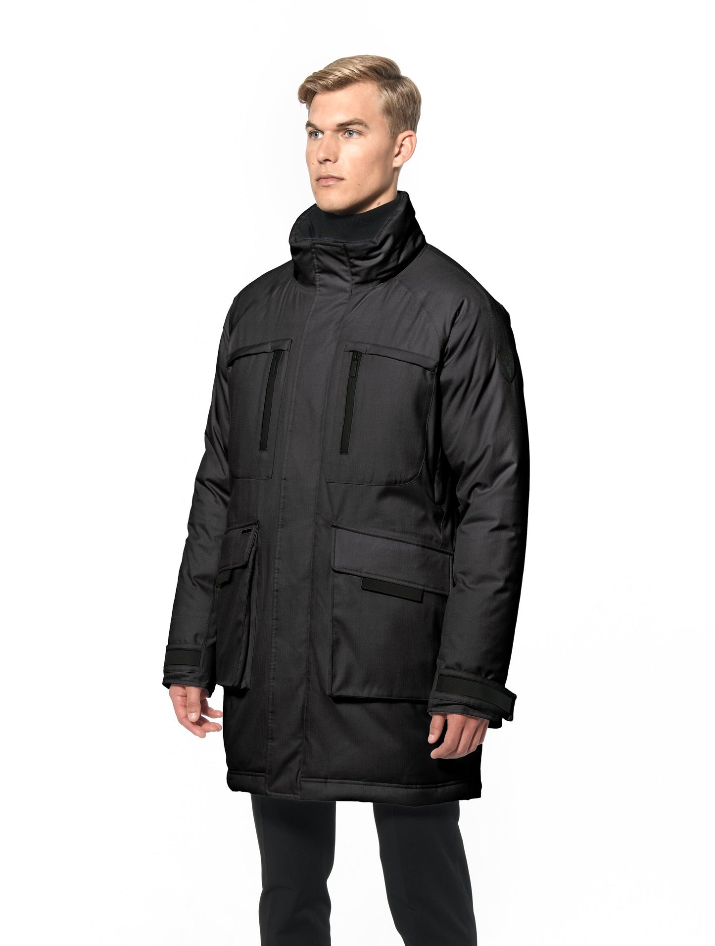 Men's thigh length down-filled parka with removable hood and removable coyote fur trim in Black