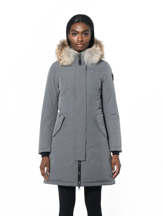 Ladies thigh length down-filled parka with non-removable hood and removable coyote fur trim in Concrete