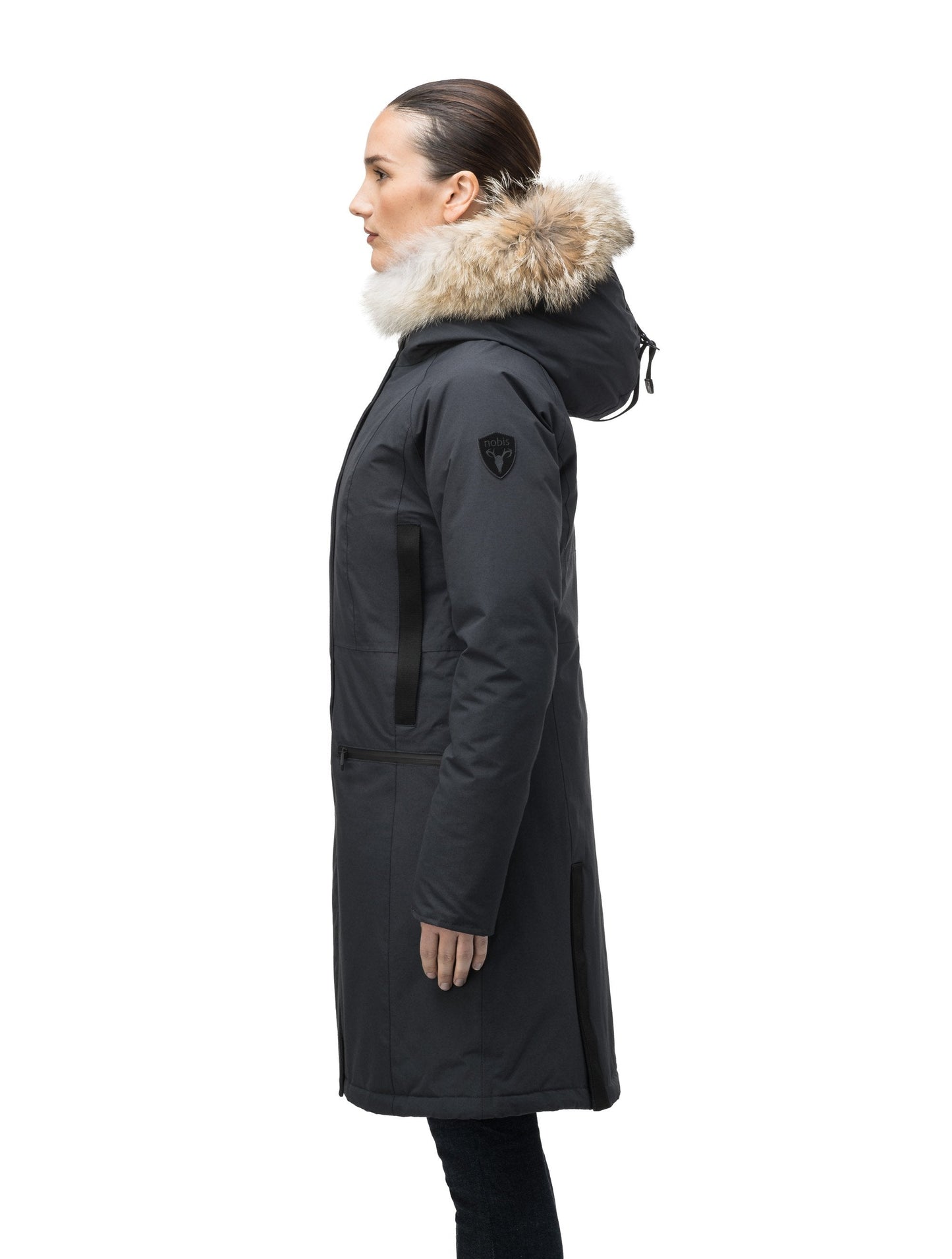 Knee length women's down filled parka with contrast ribbon accents and removable fur trim on the hood in Black