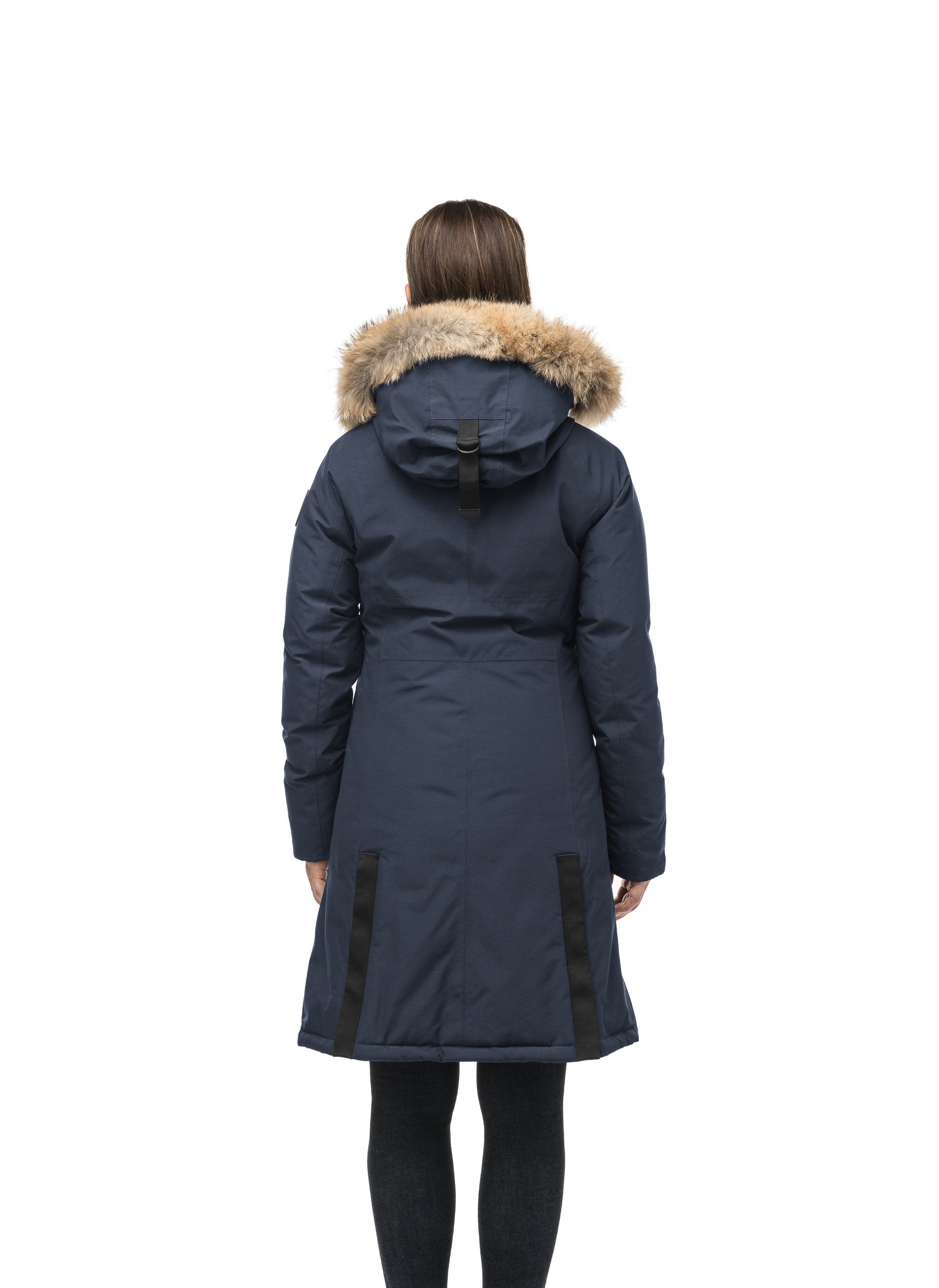 Knee length women's down filled parka with contrast ribbon accents and removable fur trim on the hood in Navy