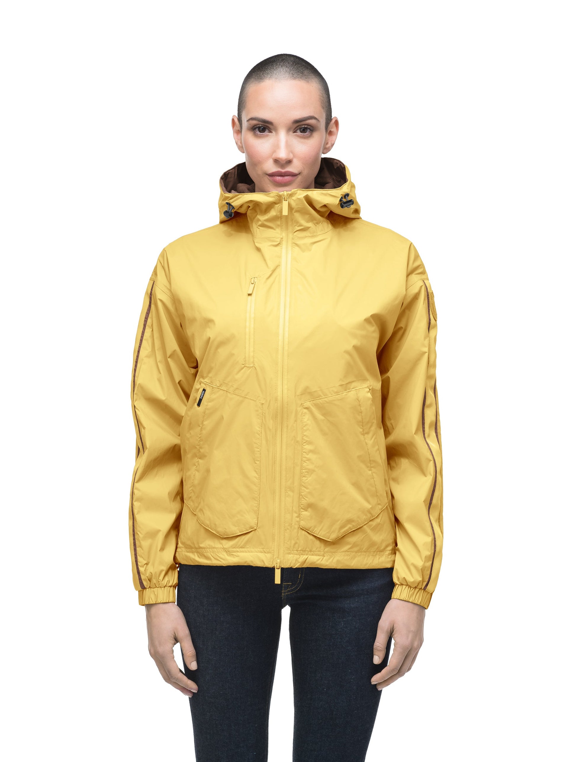 Women's waist length windbreaker with hood in Citron