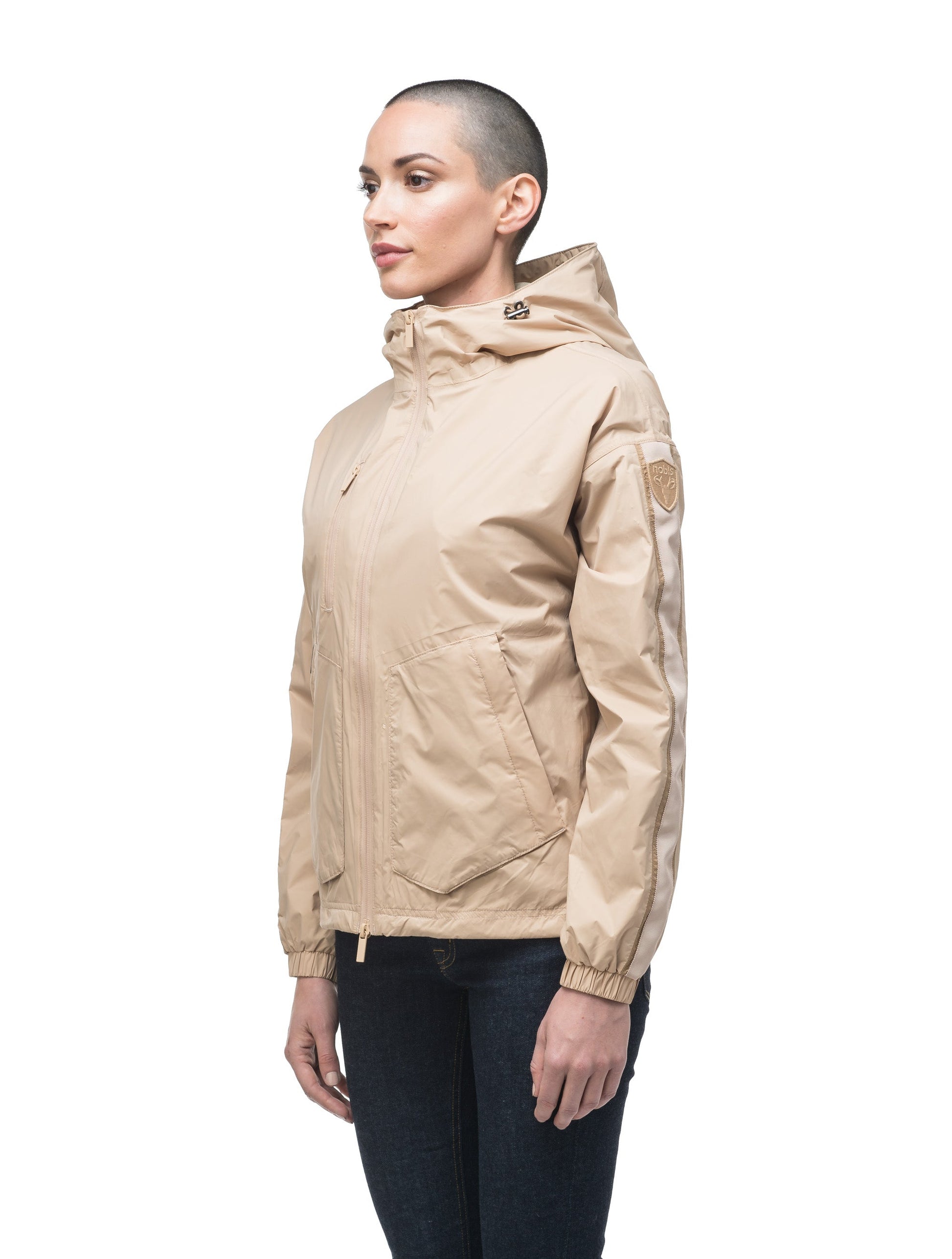 Women's waist length windbreaker with hood in Fawn