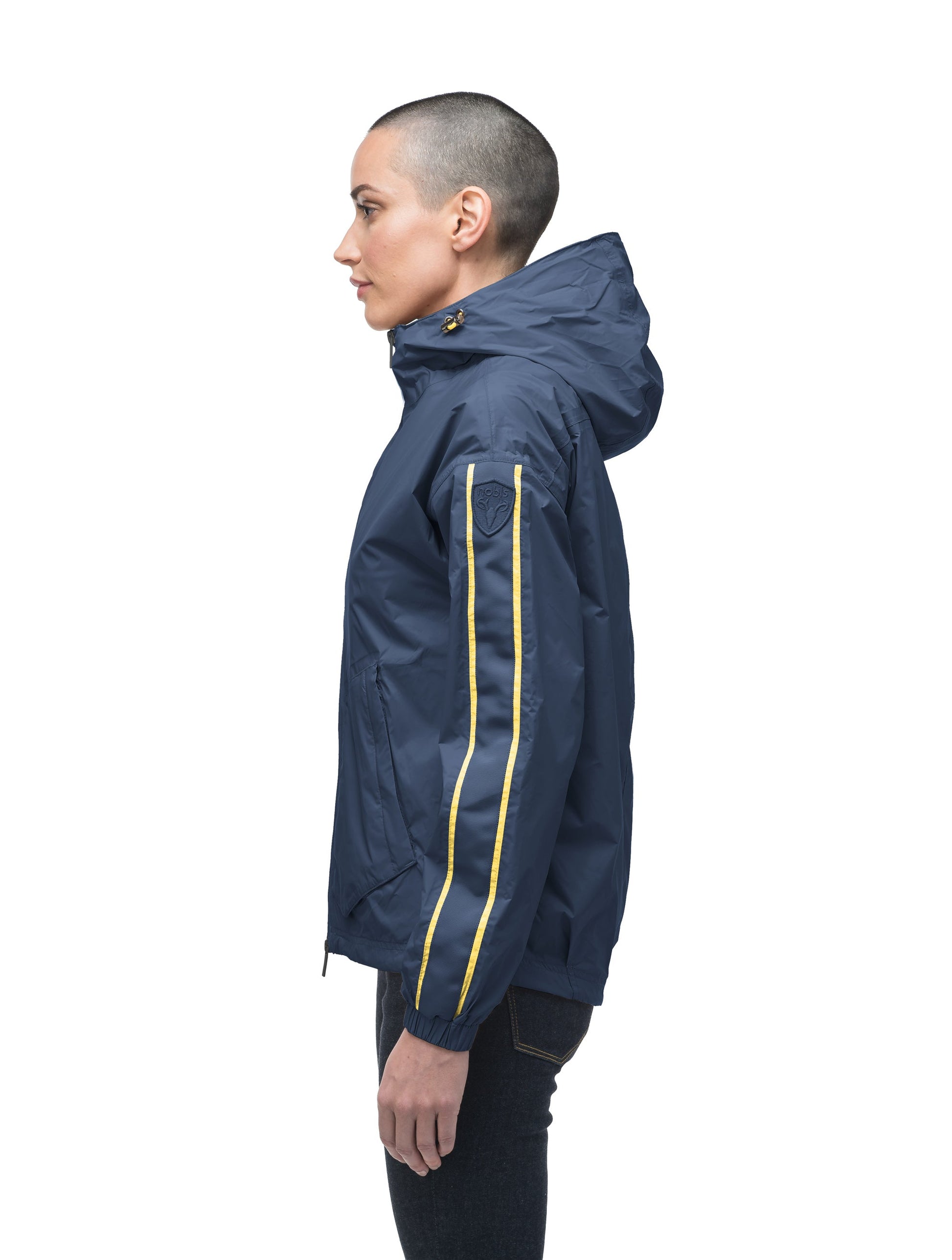 Women's waist length windbreaker with hood in Marine