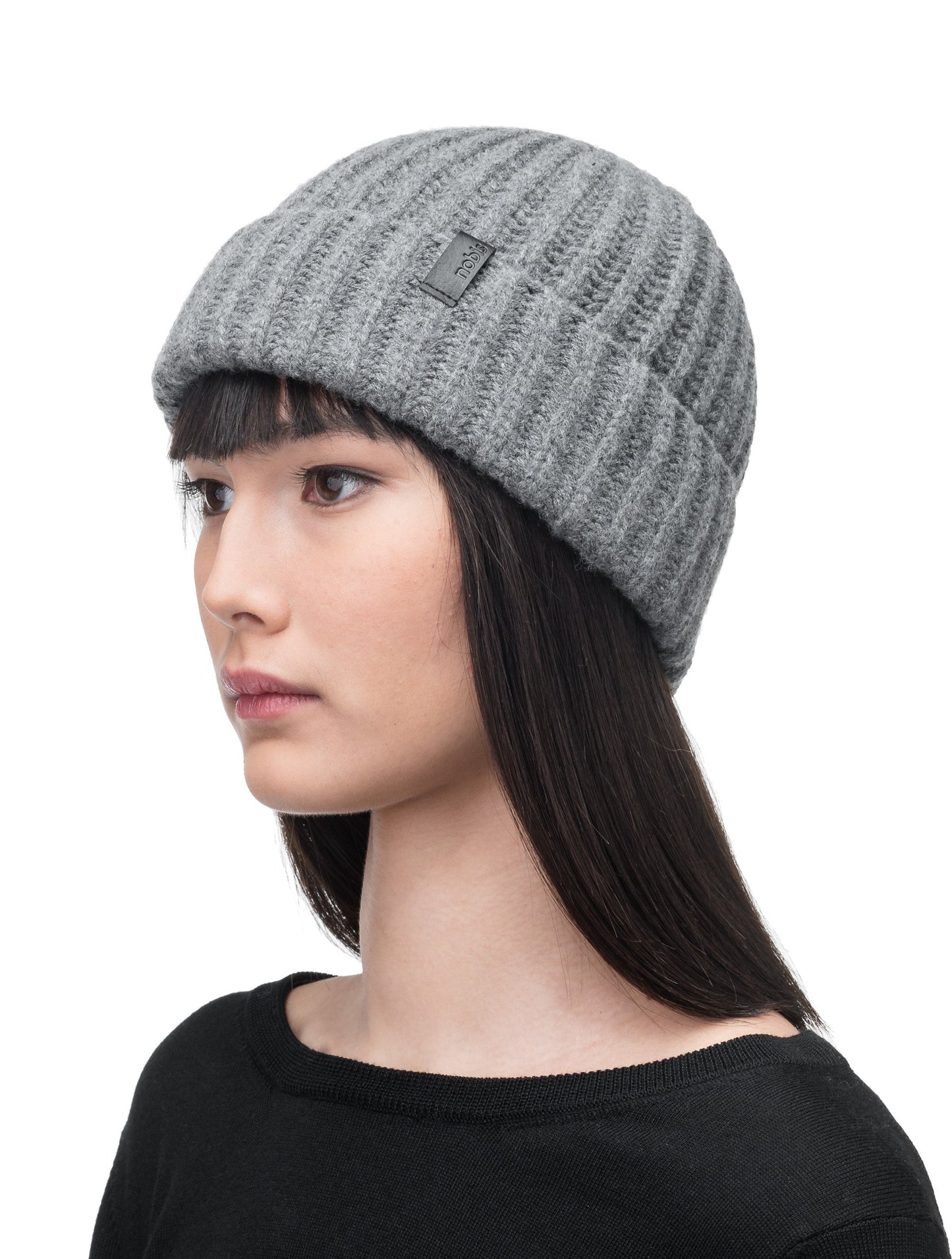 Dew Unisex Cable Knit Beanie in superfine merino wool and cashmere, and nobis leather label at cuff, in Storm