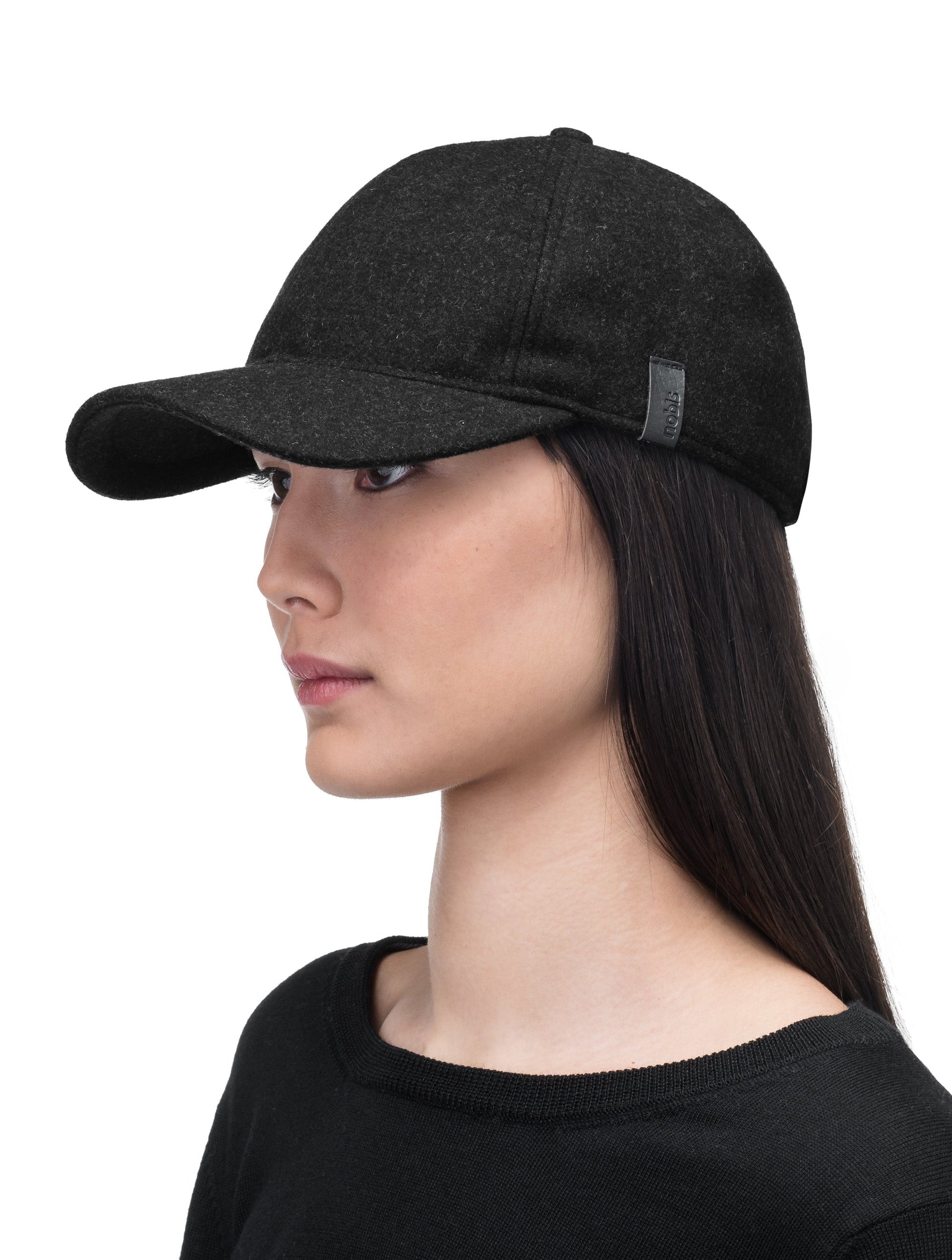 Bronte Unisex Field Cap with low structured crown, curved peak brim, and adjustable webbing strap closure, in Black