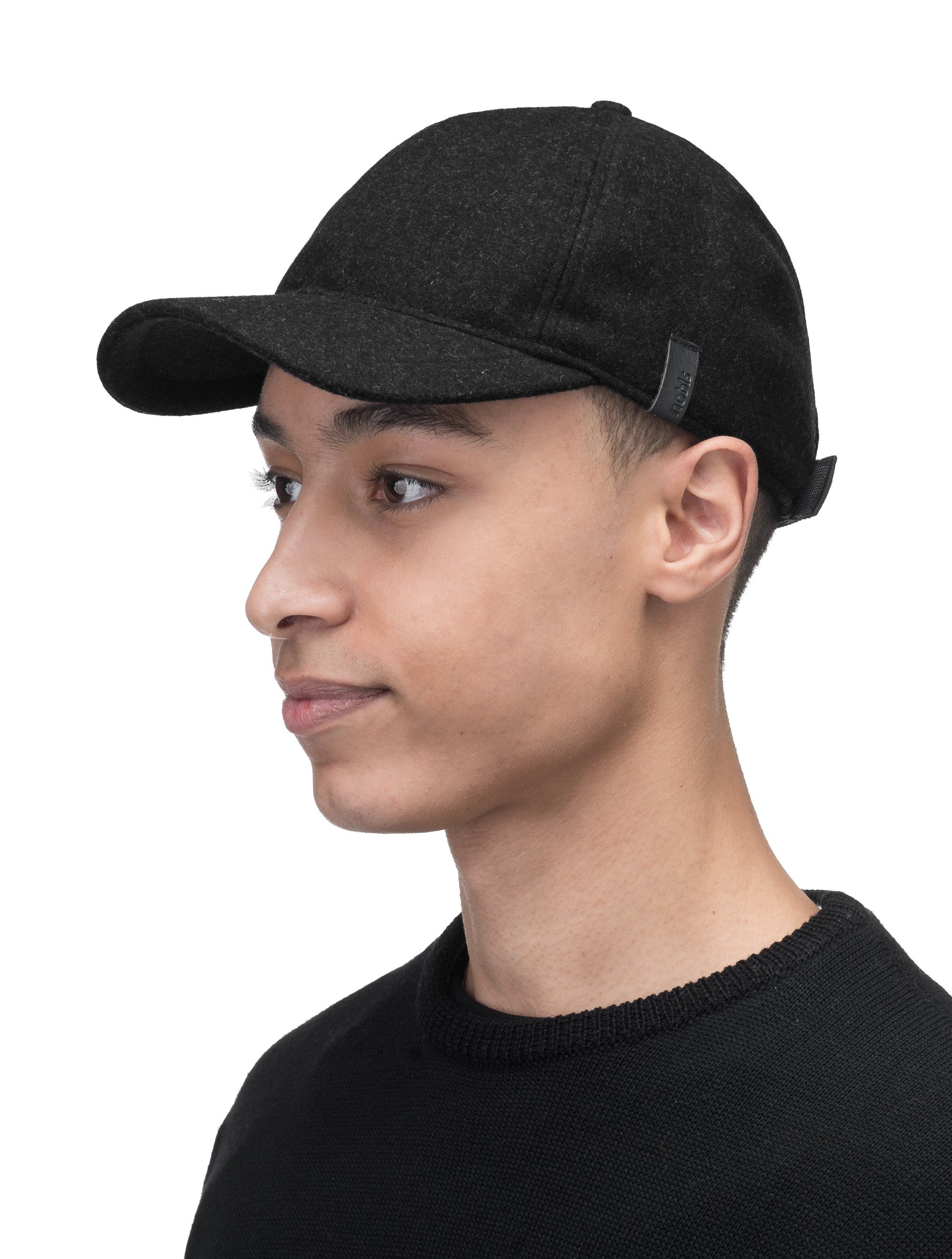 Bronte Unisex Field Cap with low structured crown, curved peak brim, and adjustable webbing strap closure, in Black