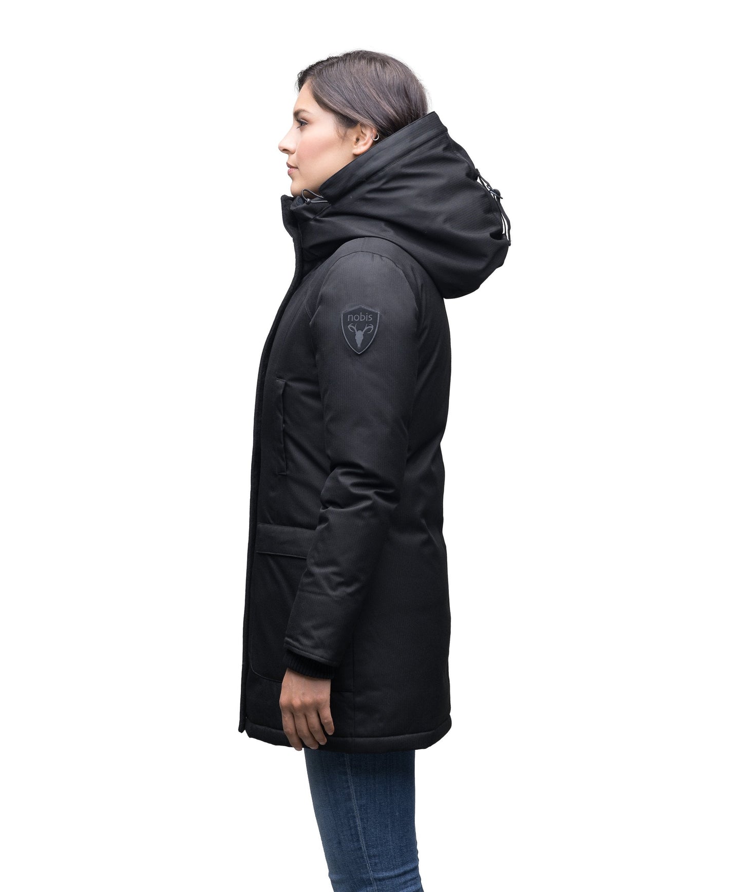 Women's down filled parka that sits just below the hip with a clean look and two hip patch pockets in CH Black