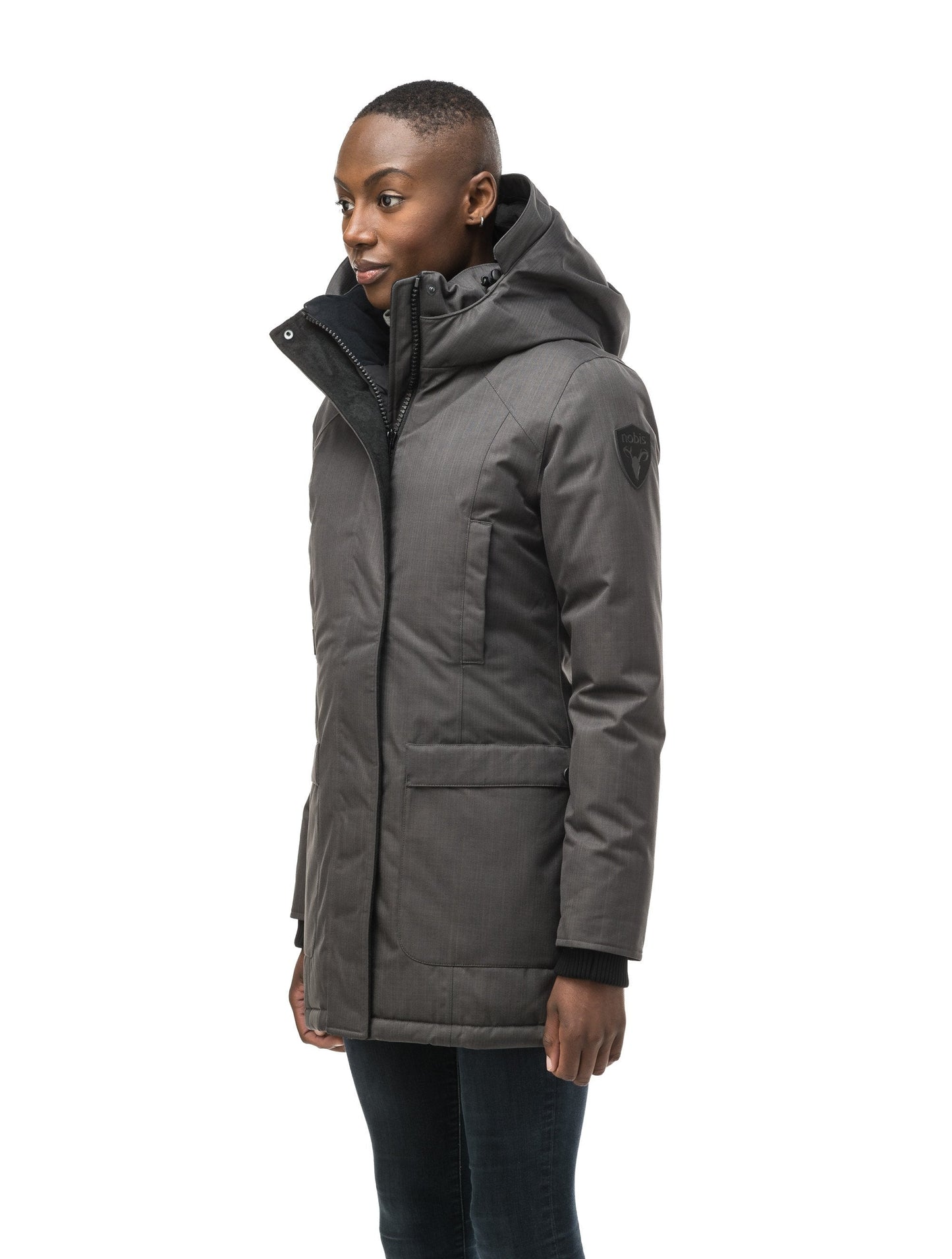 Women's down filled parka that sits just below the hip with a clean look and two hip patch pockets in CH Steel Grey