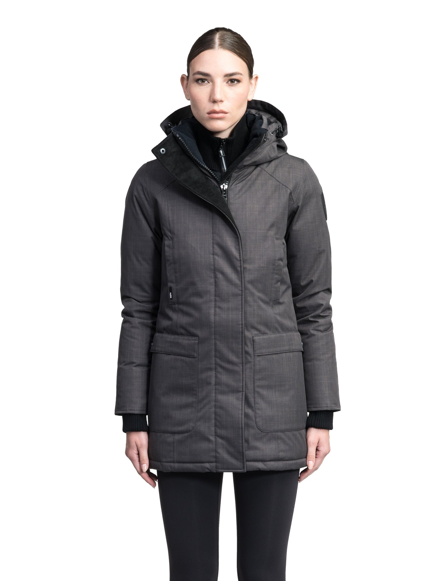 Carla Furless Ladies Parka in thigh length with Canadian Premium White Duck Down insulation, non-removable hood, centre-front zipper with magnetic closure wind flap, and four exterior pockets, in Steel Grey