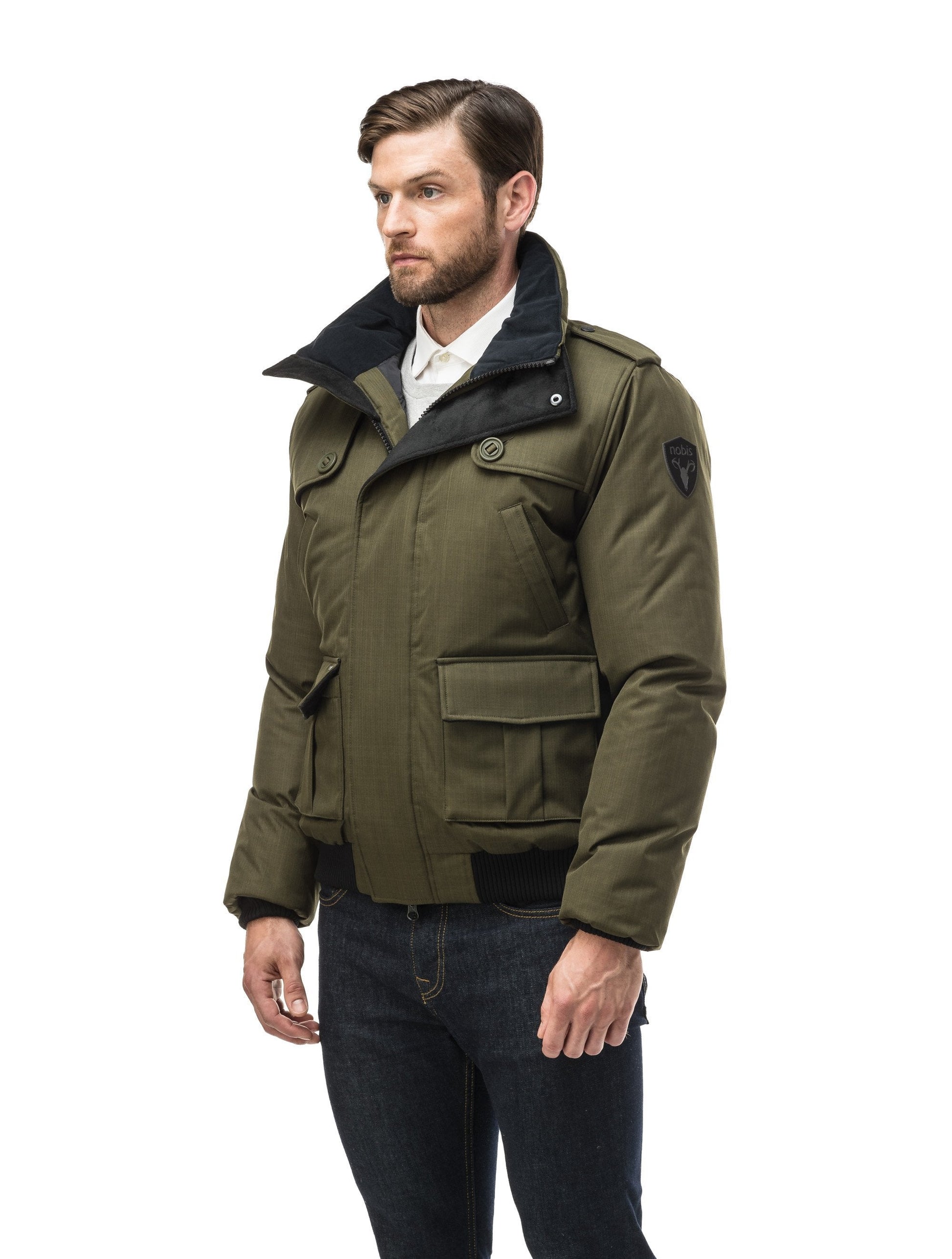 Men's down filled bomber that sits just above the hips with a completely removable hood that's windproof, waterproof, and breathable in CH Fatigue