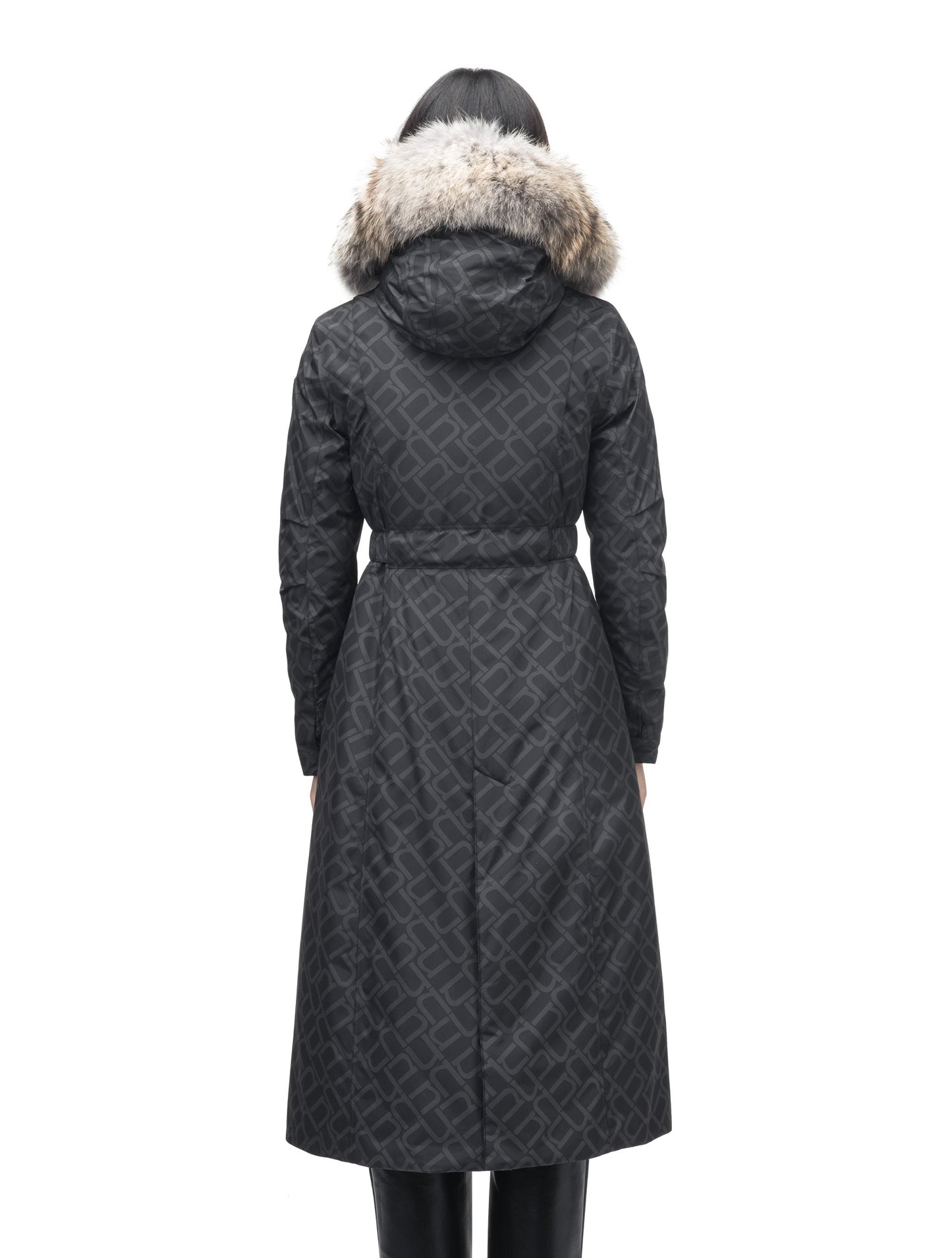 Celest Ladies Duster Parka in knee length, Canadian duck down insulation, removable hood and coyote fur trim, with adjustable belt, in Dark Monogram