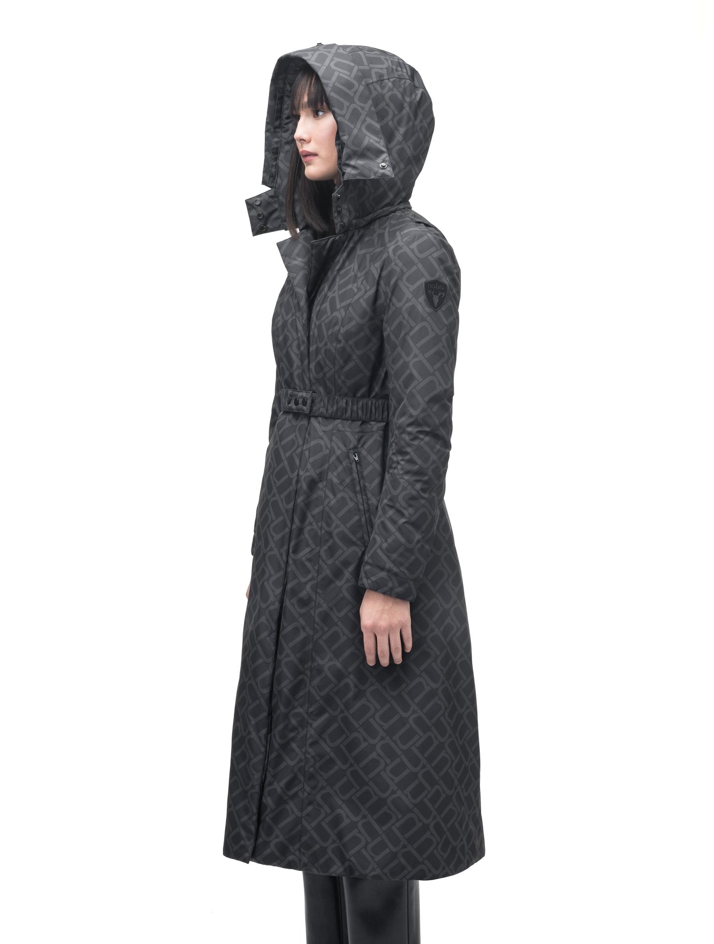 Celest Ladies Duster Parka in knee length, Canadian duck down insulation, removable hood and coyote fur trim, with adjustable belt, in Dark Monogram