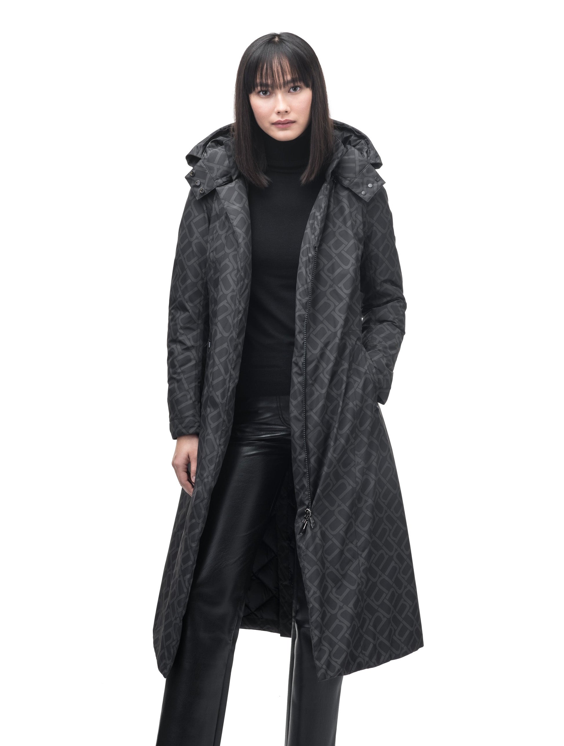 Celest Ladies Duster Parka in knee length, Canadian duck down insulation, removable hood and coyote fur trim, with adjustable belt, in Dark Monogram