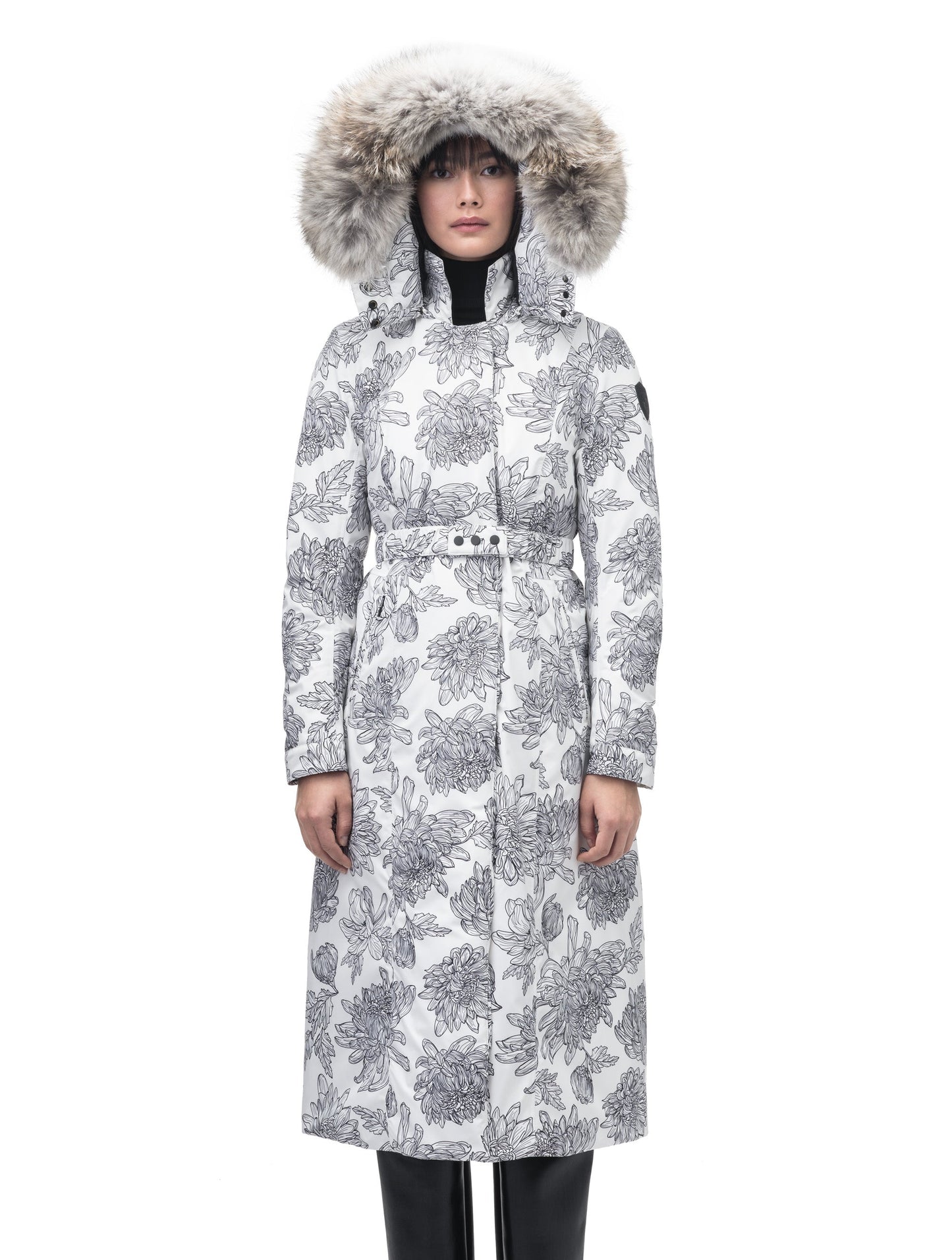 Celest Ladies Duster Parka in knee length, Canadian duck down insulation, removable hood and coyote fur trim, with adjustable belt, in White Floral