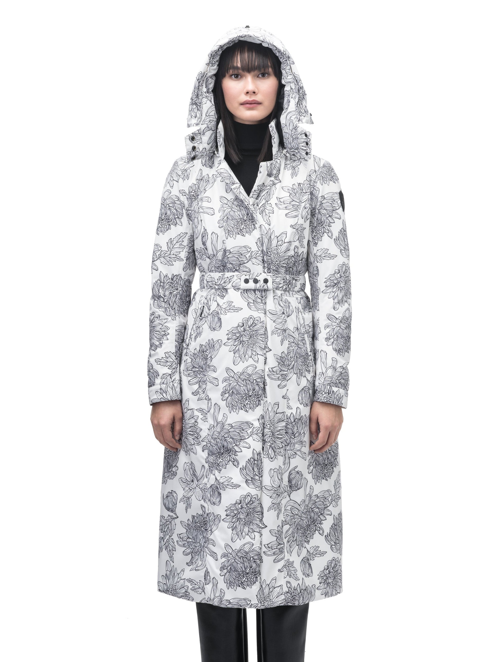 Celest Ladies Duster Parka in knee length, Canadian duck down insulation, removable hood and coyote fur trim, with adjustable belt, in White Floral