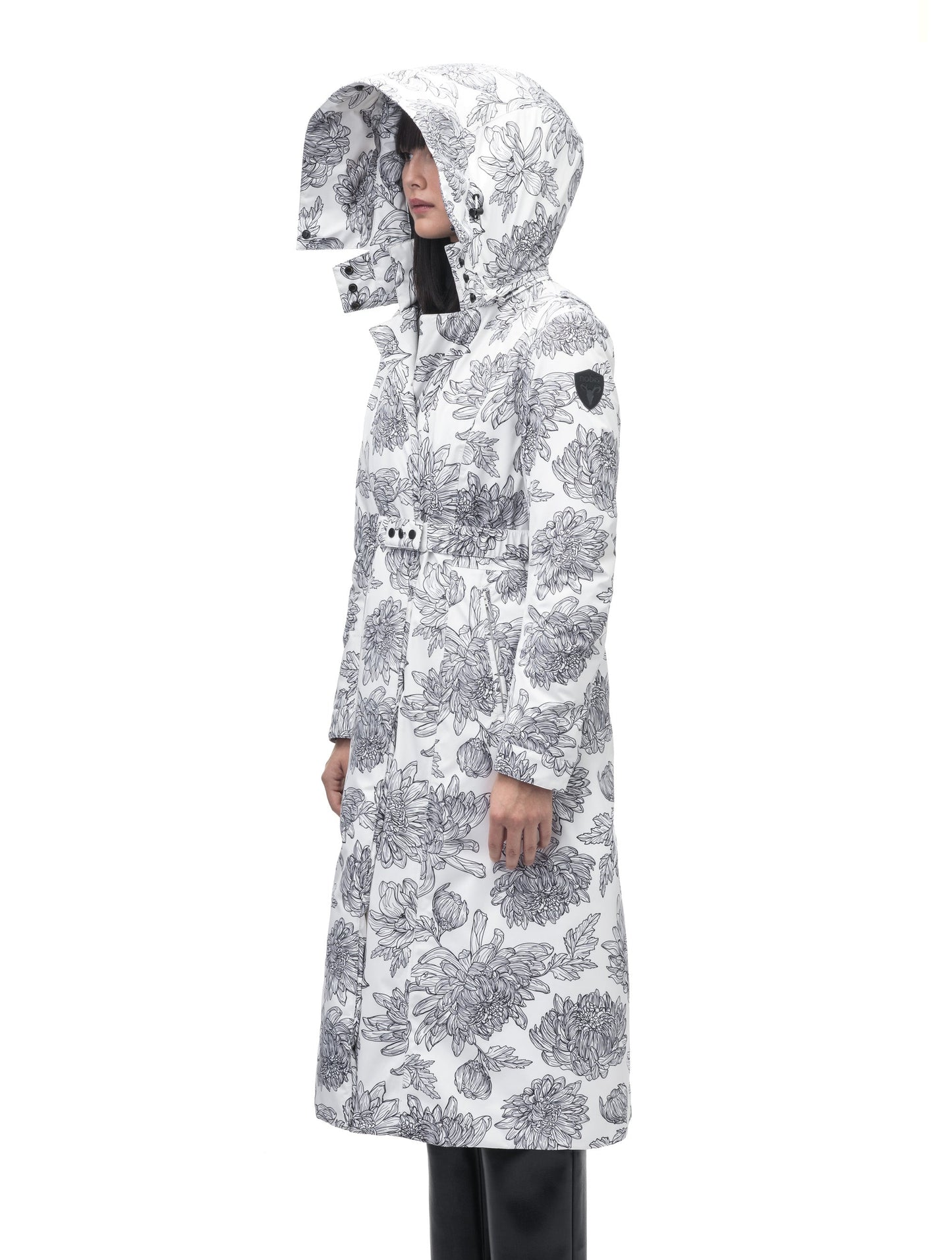 Celest Ladies Duster Parka in knee length, Canadian duck down insulation, removable hood and coyote fur trim, with adjustable belt, in White Floral