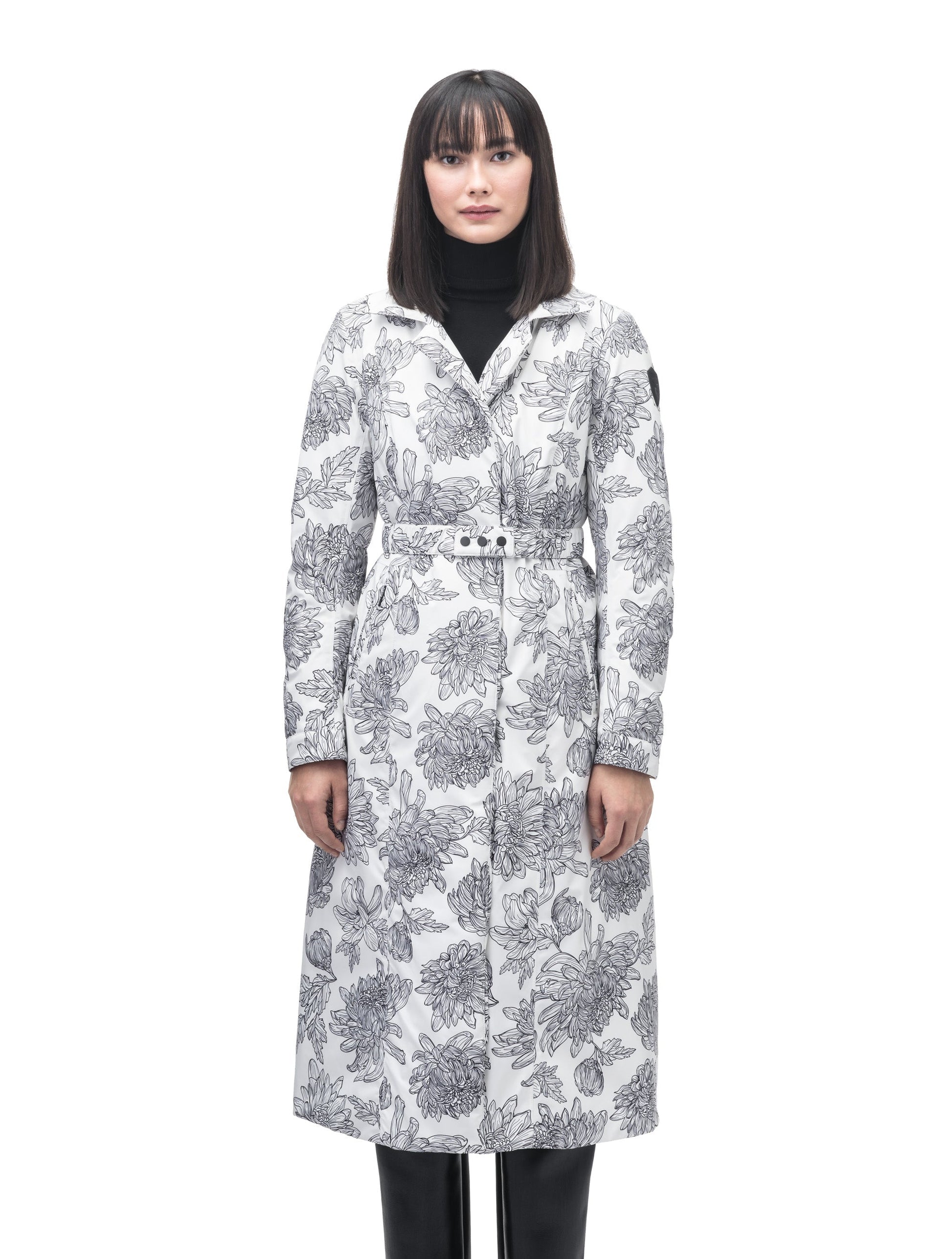 Celest Ladies Duster Parka in knee length, Canadian duck down insulation, removable hood and coyote fur trim, with adjustable belt, in White Floral