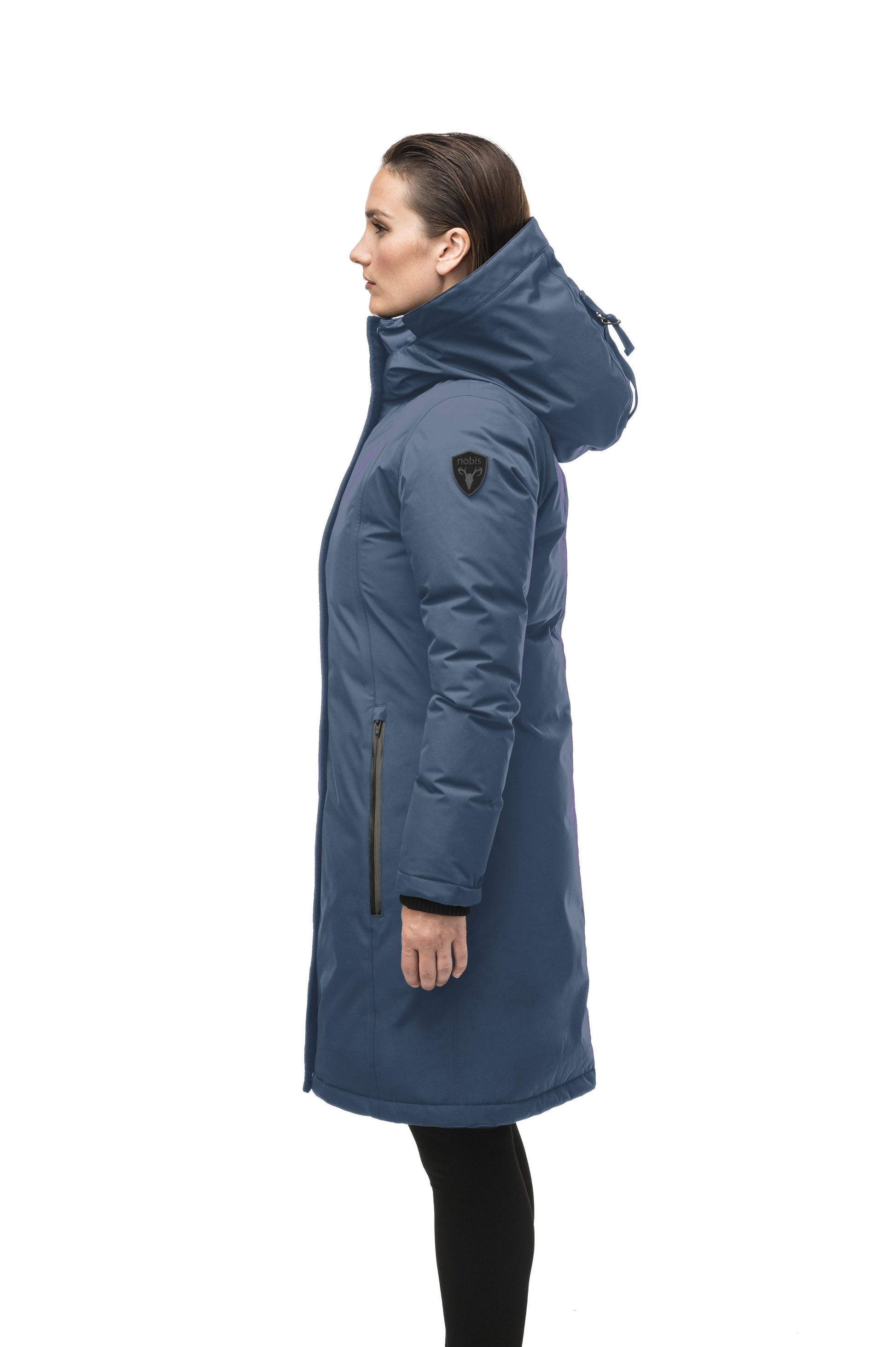 Minimalist down filled women's parka with fur free attached hood in Marine