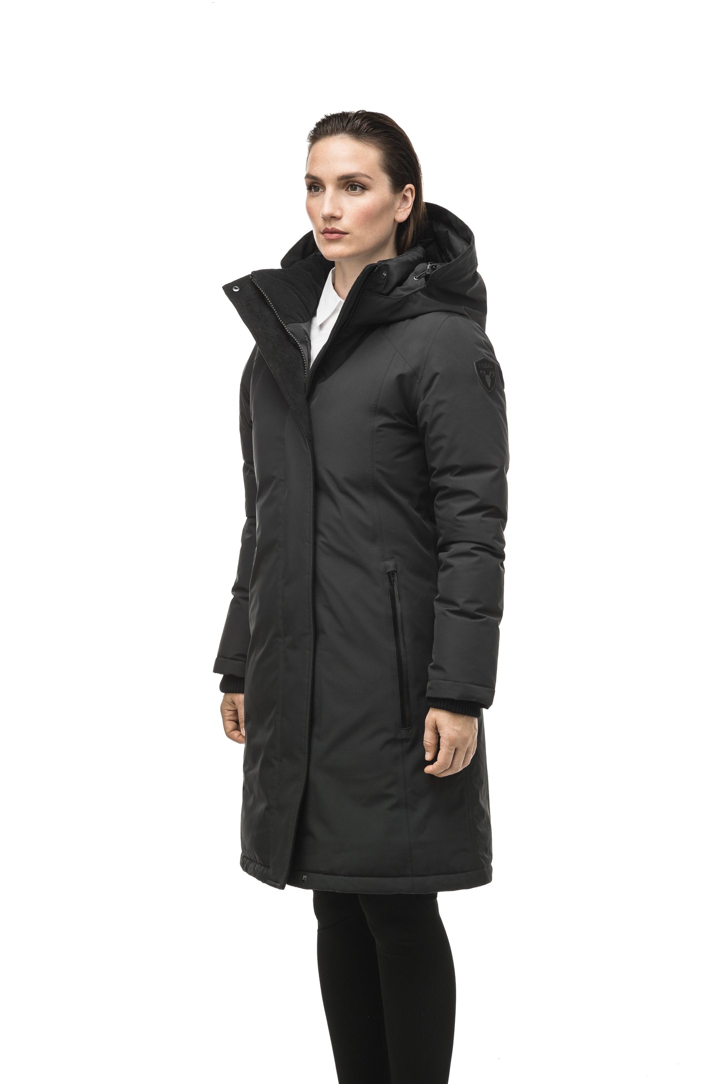 Minimalist down filled women's parka with fur free attached hood in Black