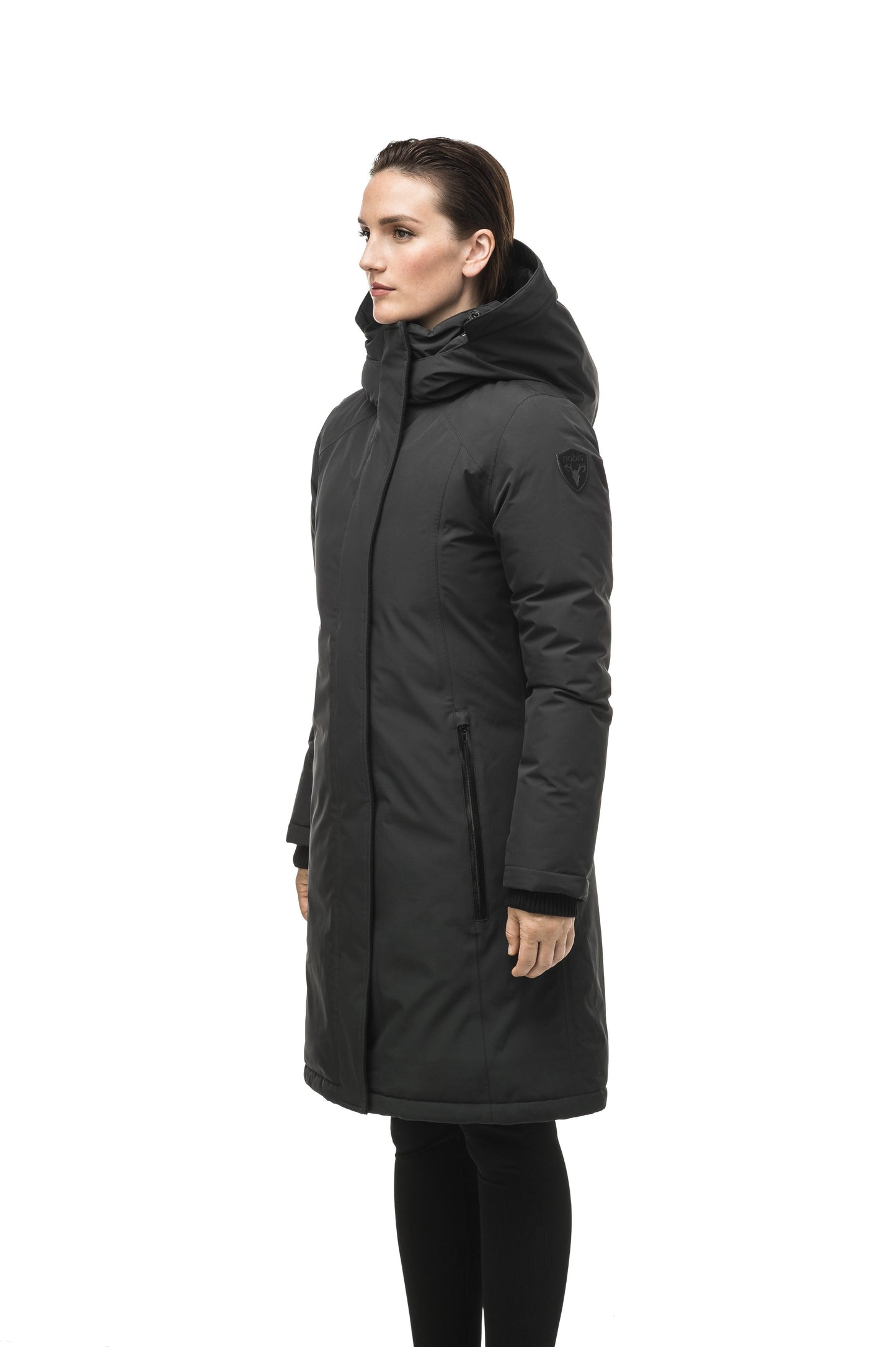 Minimalist down filled women's parka with fur free attached hood in Black