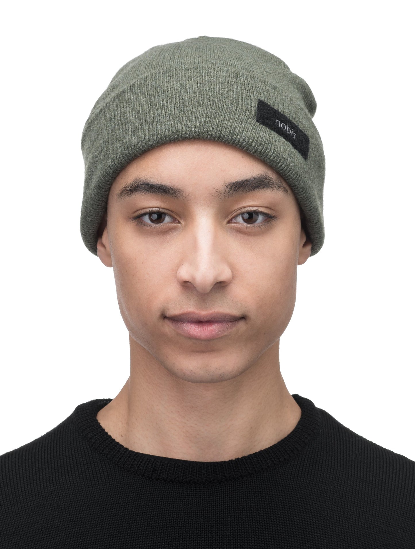 Dalia Unisex Jersey Knit Beanie in extrafine merino wool, and nobis label on cuff, in Evergreen