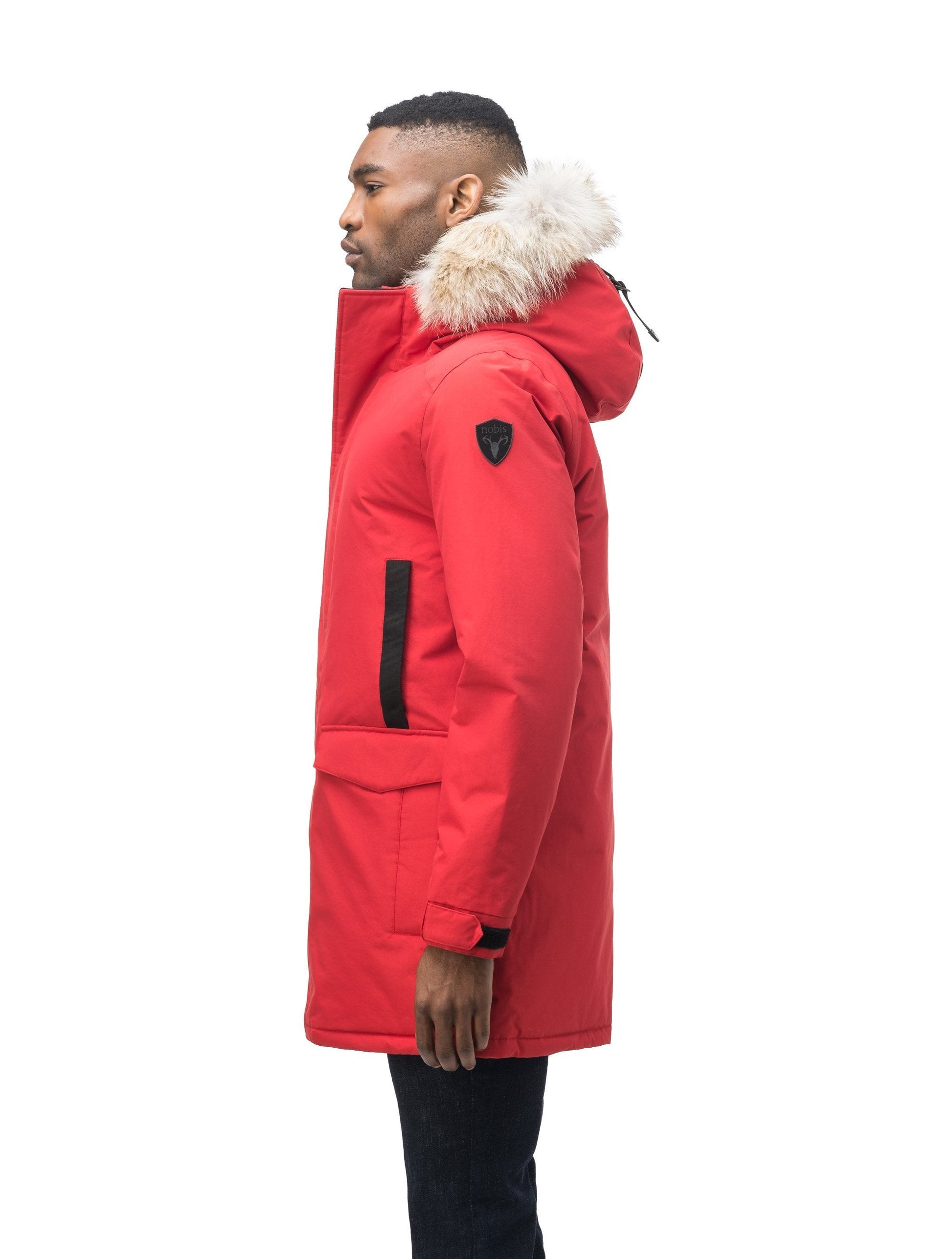 Lightweight men's parka with duck down fill and removable fur trim around the hood in Vermillion