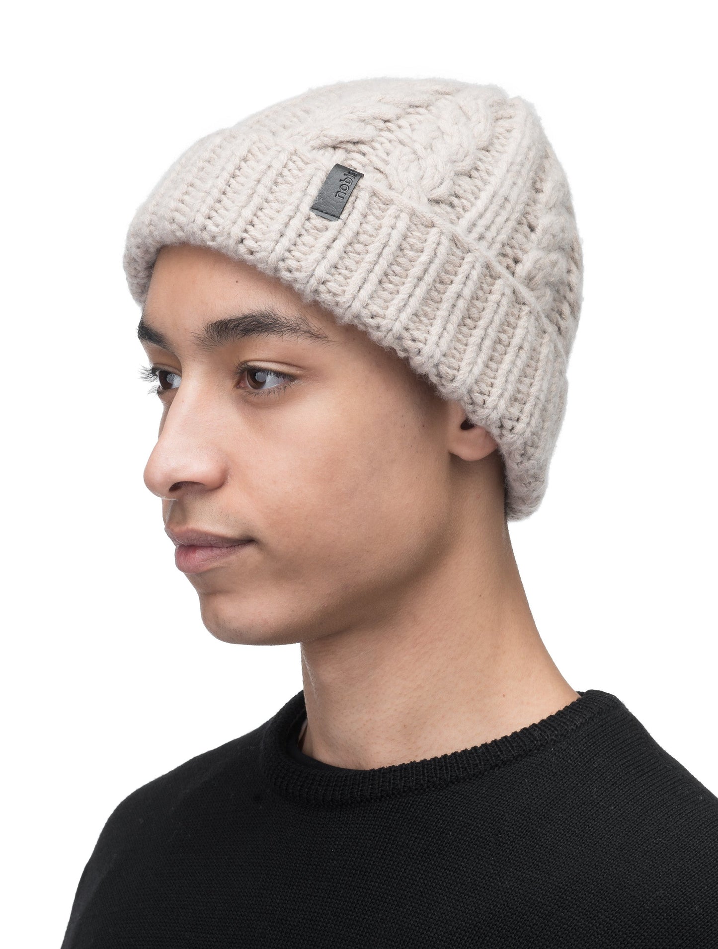 Dew Unisex Cable Knit Beanie in superfine merino wool and cashmere, and nobis leather label at cuff, in Khaki