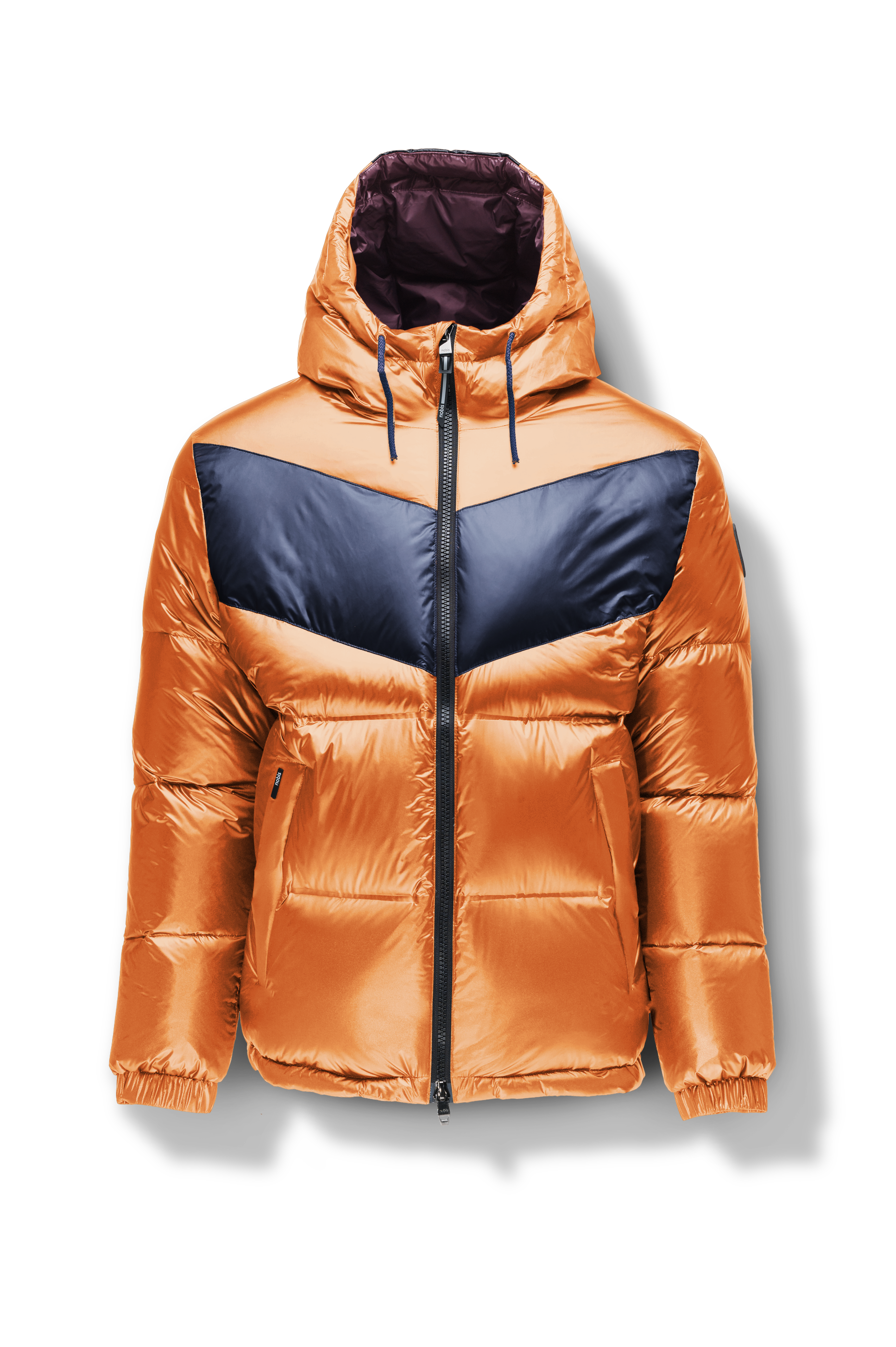 Dyna Men's Chevron Quilted Puffer Jacket in hip length, premium cire technical nylon taffeta fabrication, Premium Canadian origin White Duck Down insulation, non-removable down-filled hood, two-way centre-front zipper, fleece-lined zipper pockets at waist, pit zipper vents, in Burnt Orange