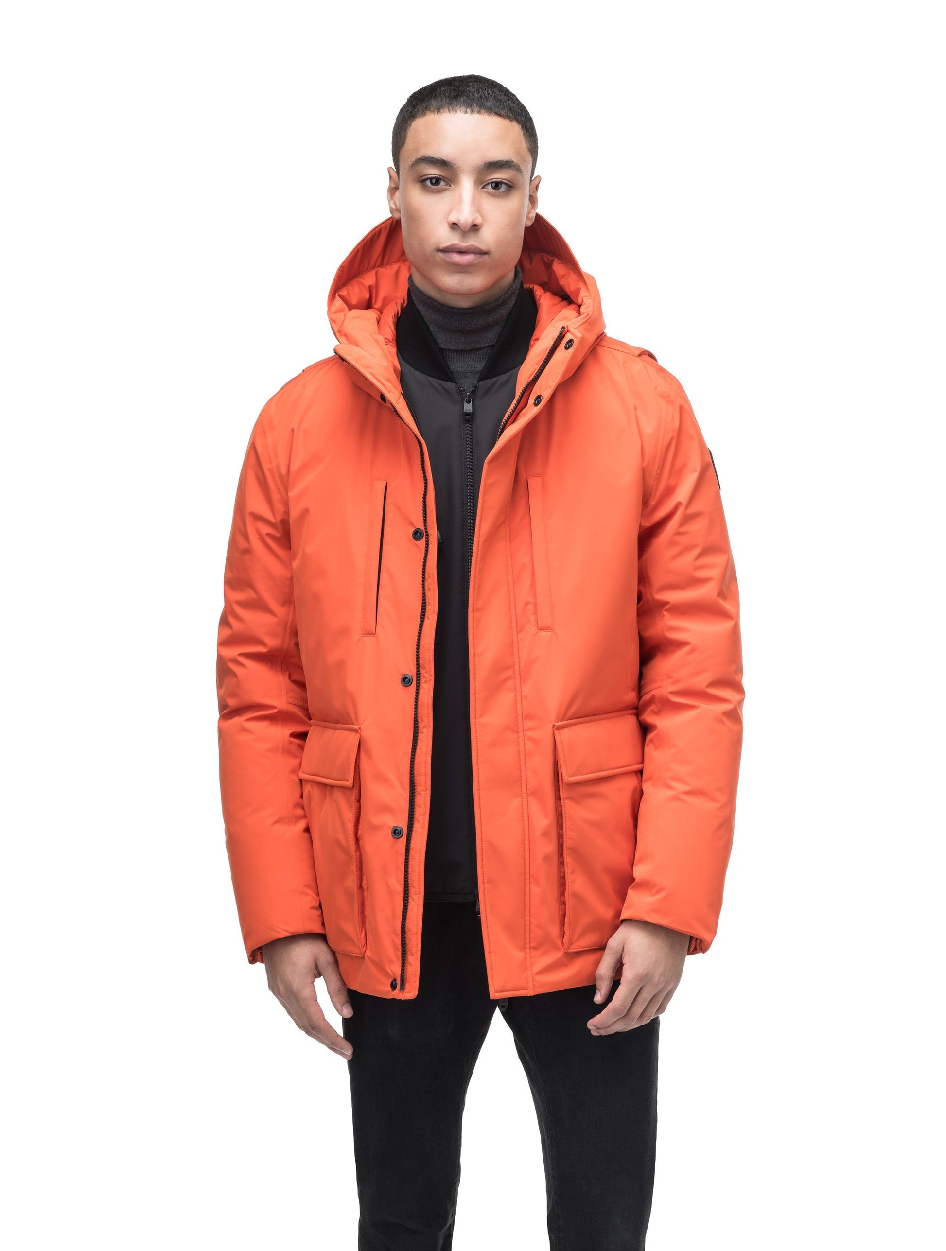 Geo Men's Short Parka in hip length, Canadian duck down insulation, non-removable hood, and two-way zipper, in Terracotta