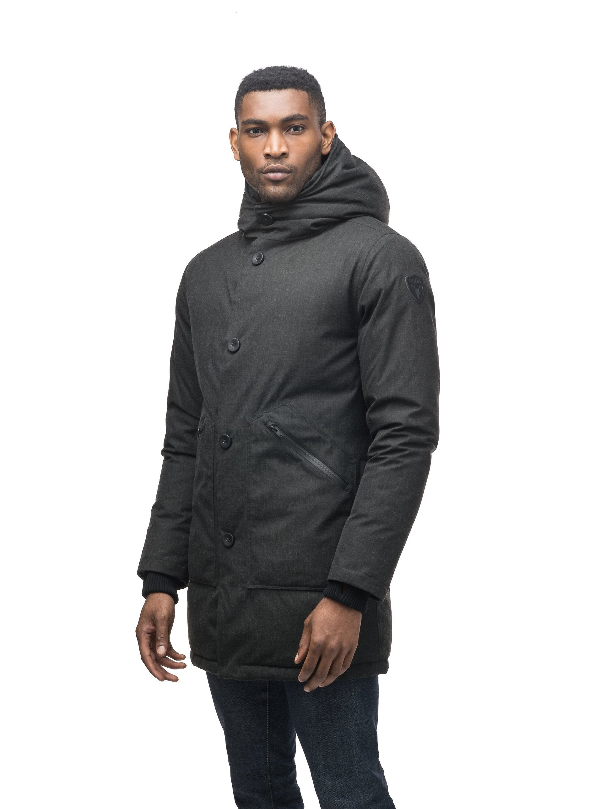 Men's fur free hooded parka with zipper and button closure placket featuring two oversized front pockets in H. Black