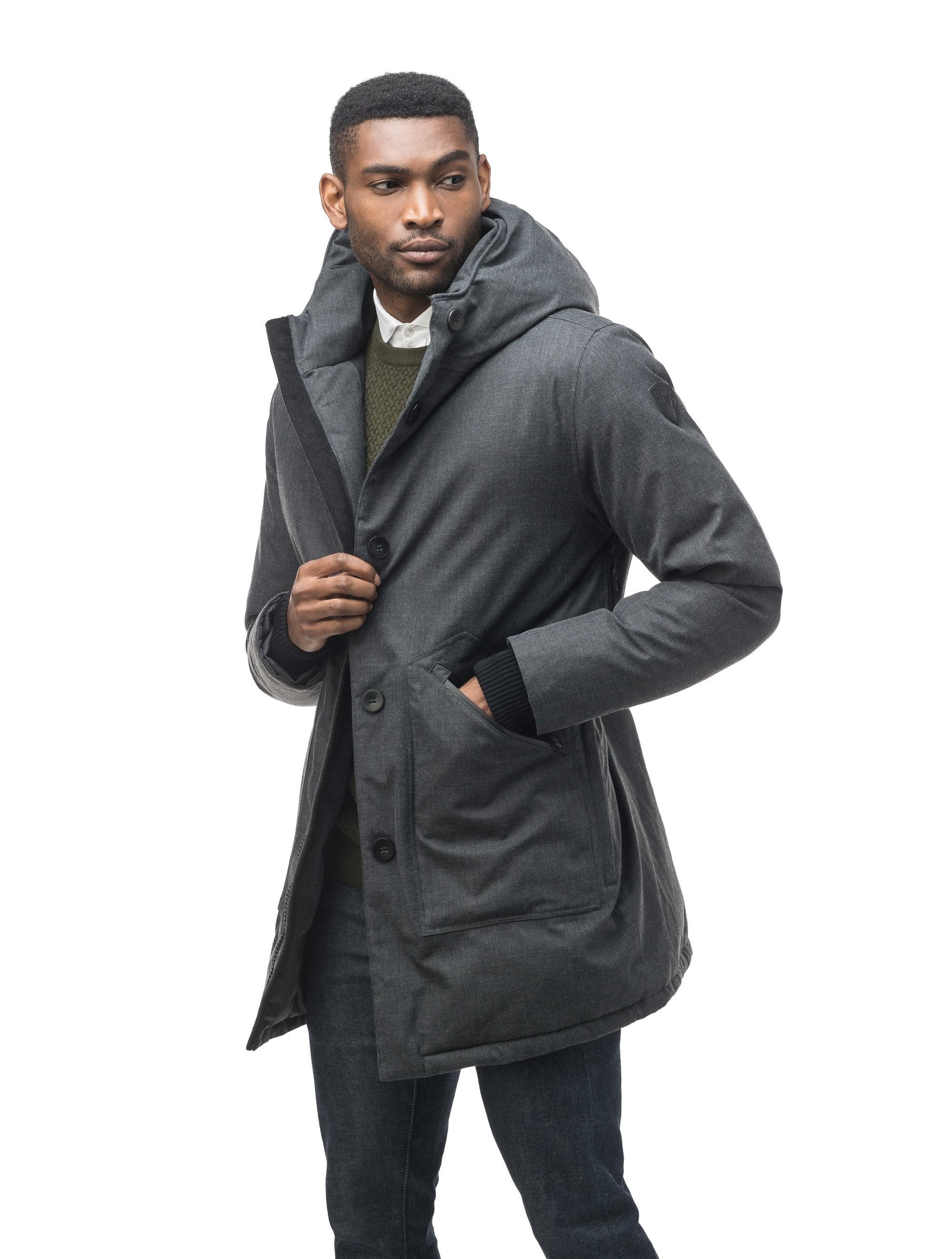 Men's fur free hooded parka with zipper and button closure placket featuring two oversized front pockets in H. Charcoal