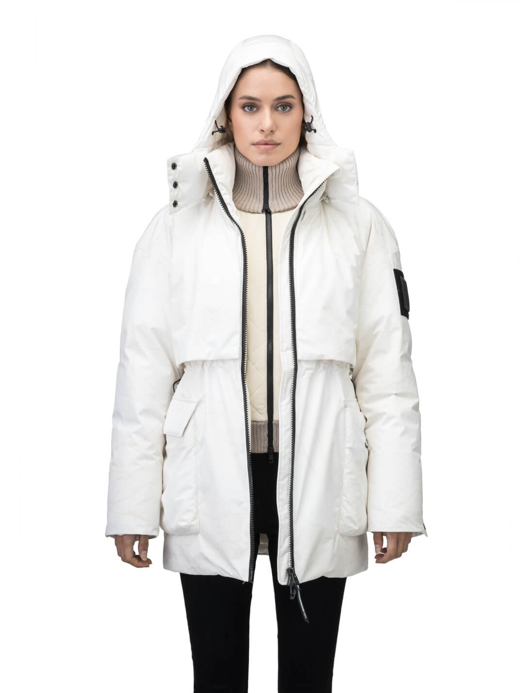 Haelyn Ladies Short Utility Parka in thigh length, 3-Ply Micro Denier fabrication, Premium Canadian White Duck Down insulation, removable down-filled hood, two-way centre front zipper, hidden adjustable cord at waist, adjustable snap cuffs, and four exterior patch pockets at front, in Wheat Desert