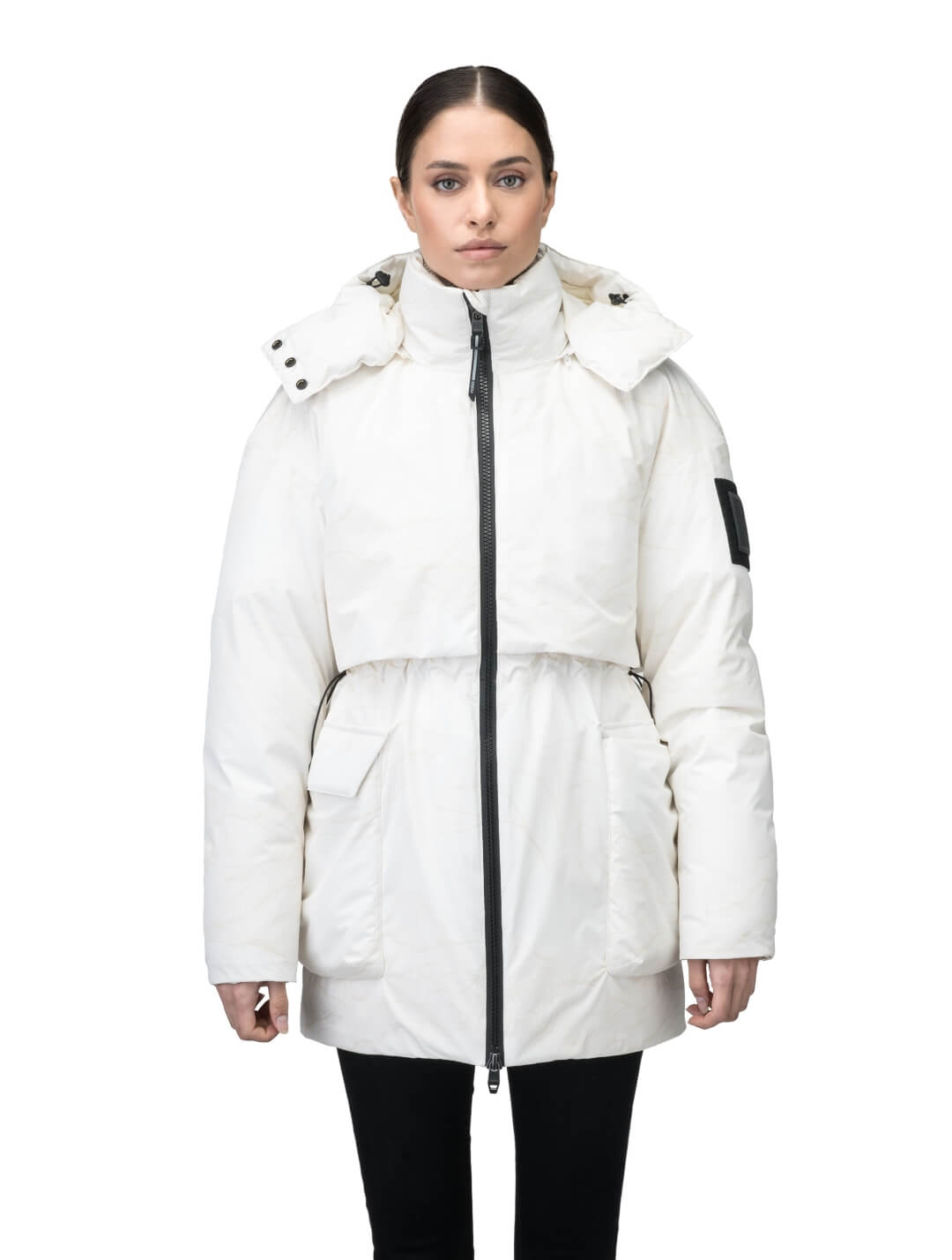 Haelyn Ladies Short Utility Parka in thigh length, 3-Ply Micro Denier fabrication, Premium Canadian White Duck Down insulation, removable down-filled hood, two-way centre front zipper, hidden adjustable cord at waist, adjustable snap cuffs, and four exterior patch pockets at front, in Wheat Desert