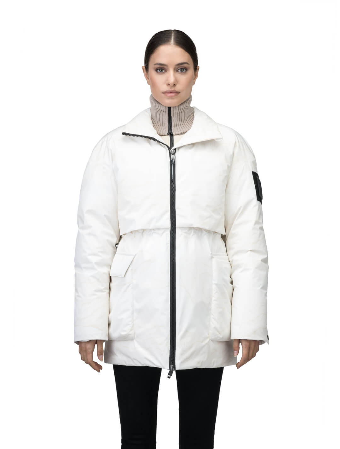 Haelyn Ladies Short Utility Parka in thigh length, 3-Ply Micro Denier fabrication, Premium Canadian White Duck Down insulation, removable down-filled hood, two-way centre front zipper, hidden adjustable cord at waist, adjustable snap cuffs, and four exterior patch pockets at front, in Wheat Desert