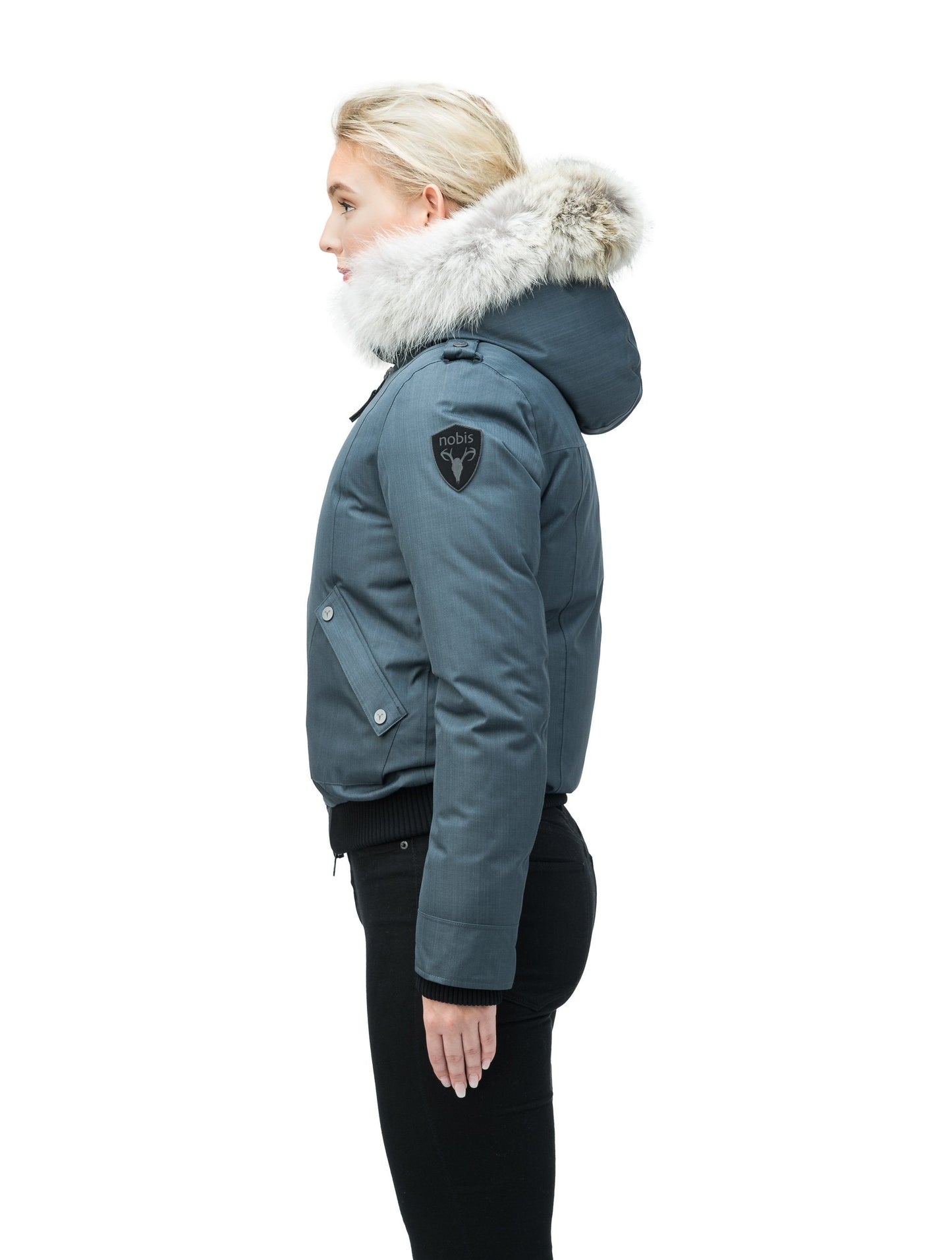 Women's bomber style down filled jacket with a removable hood and fur trim in CH Balsam