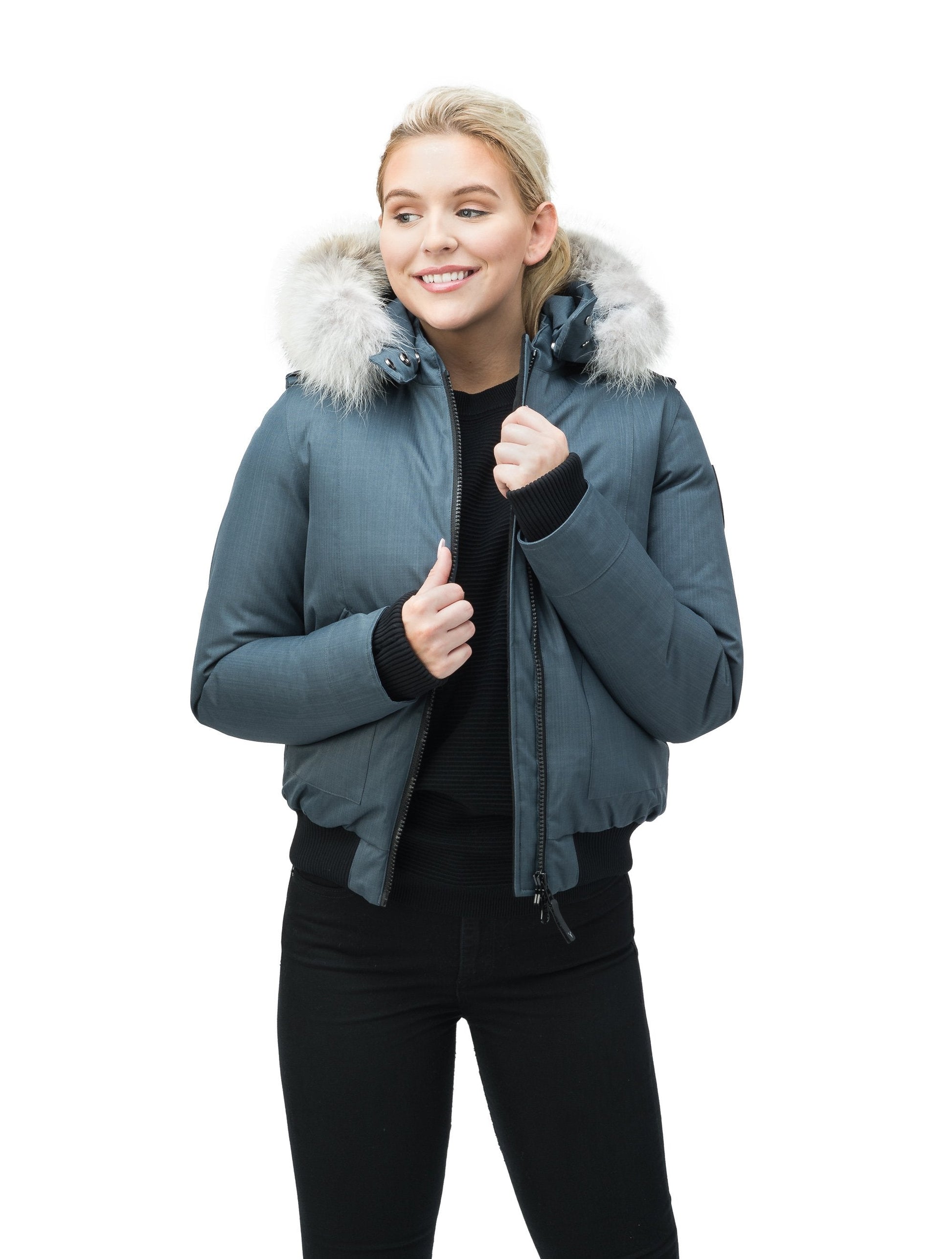 Women's bomber style down filled jacket with a removable hood and fur trim in CH Balsam