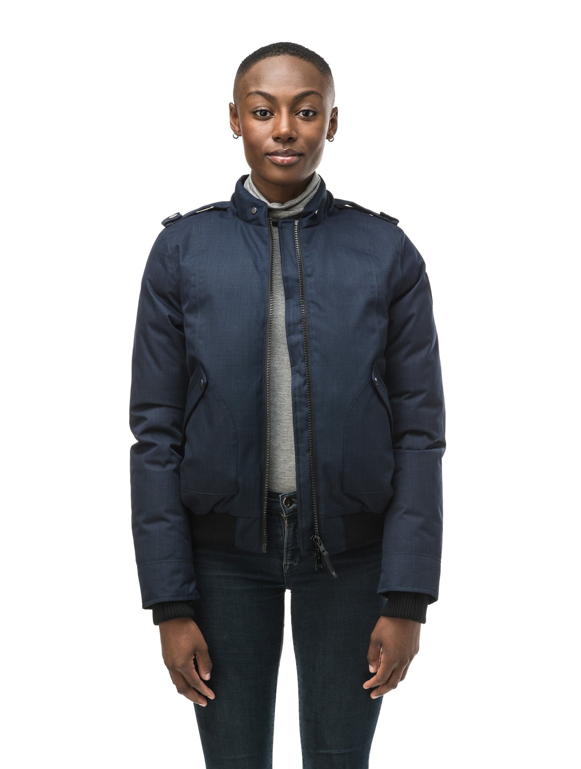 Women's bomber style down filled jacket with a removable hood and fur trim in CH Navy