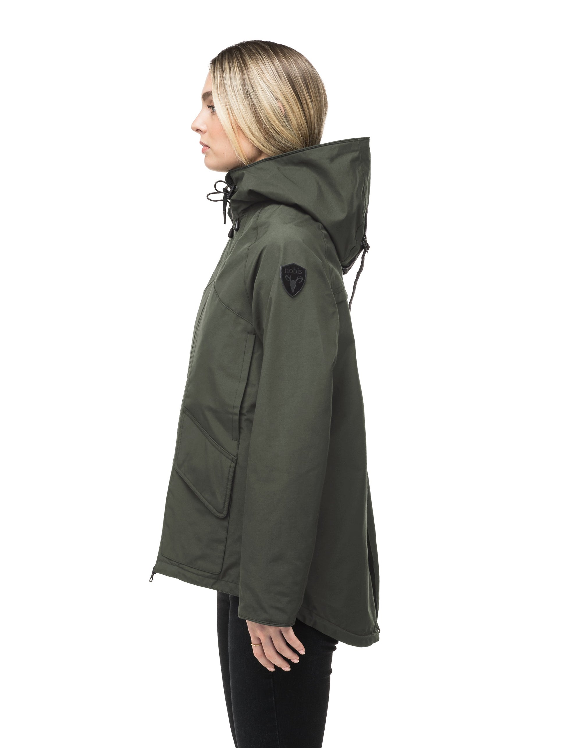 Women's hooded rain jacket with high low hem in Dark Forest