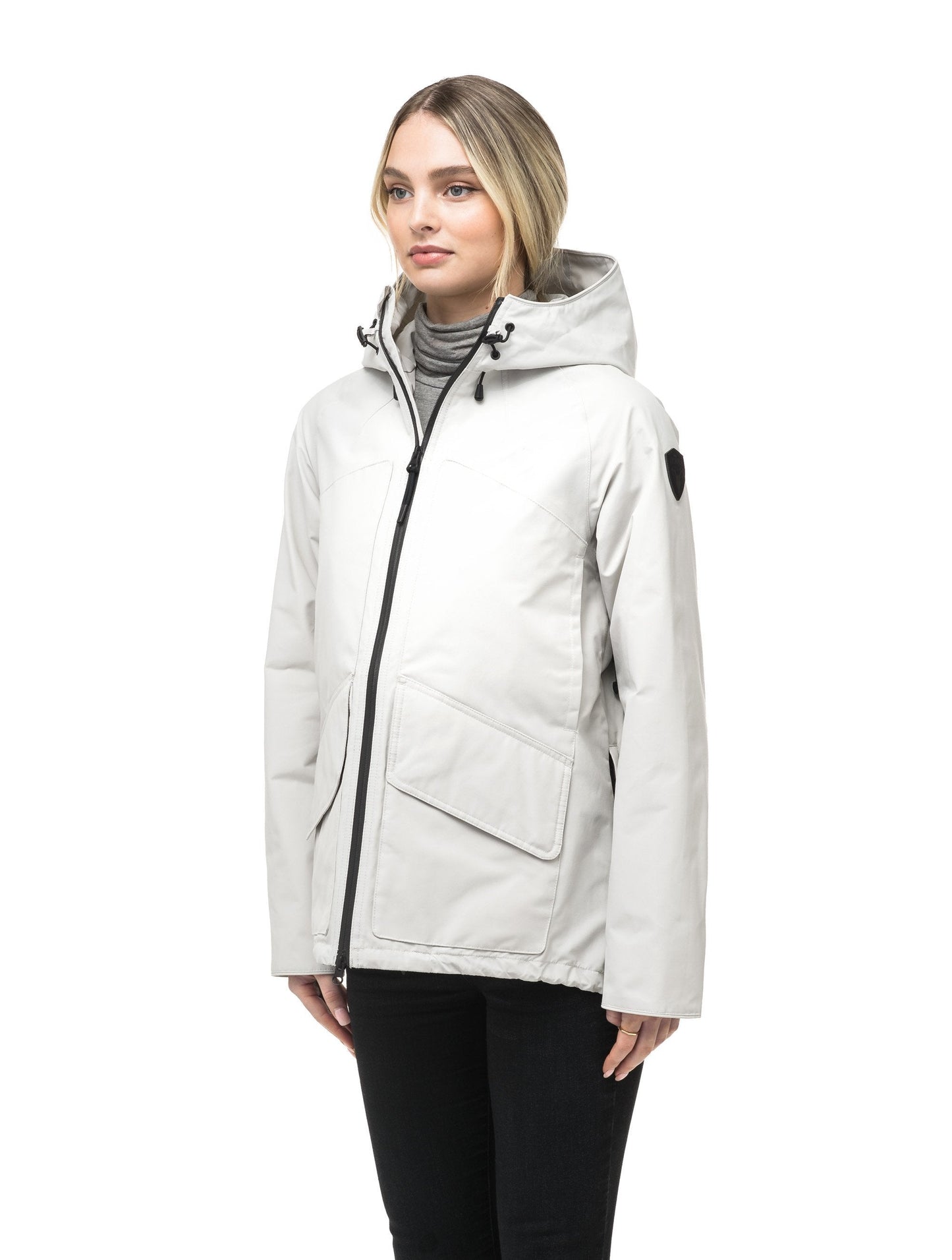 Women's hooded rain jacket with high low hem in Light Grey