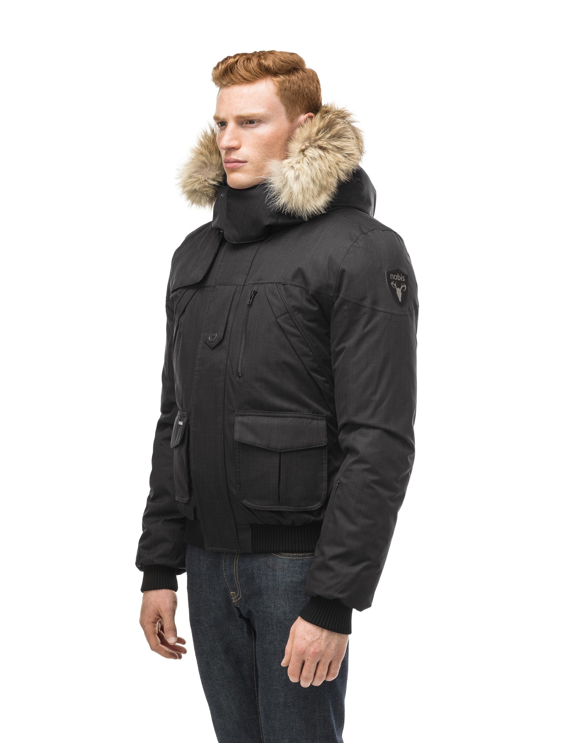 Men's classic down bomber with two patch pockets and a right shoulder storm flap in CH Black