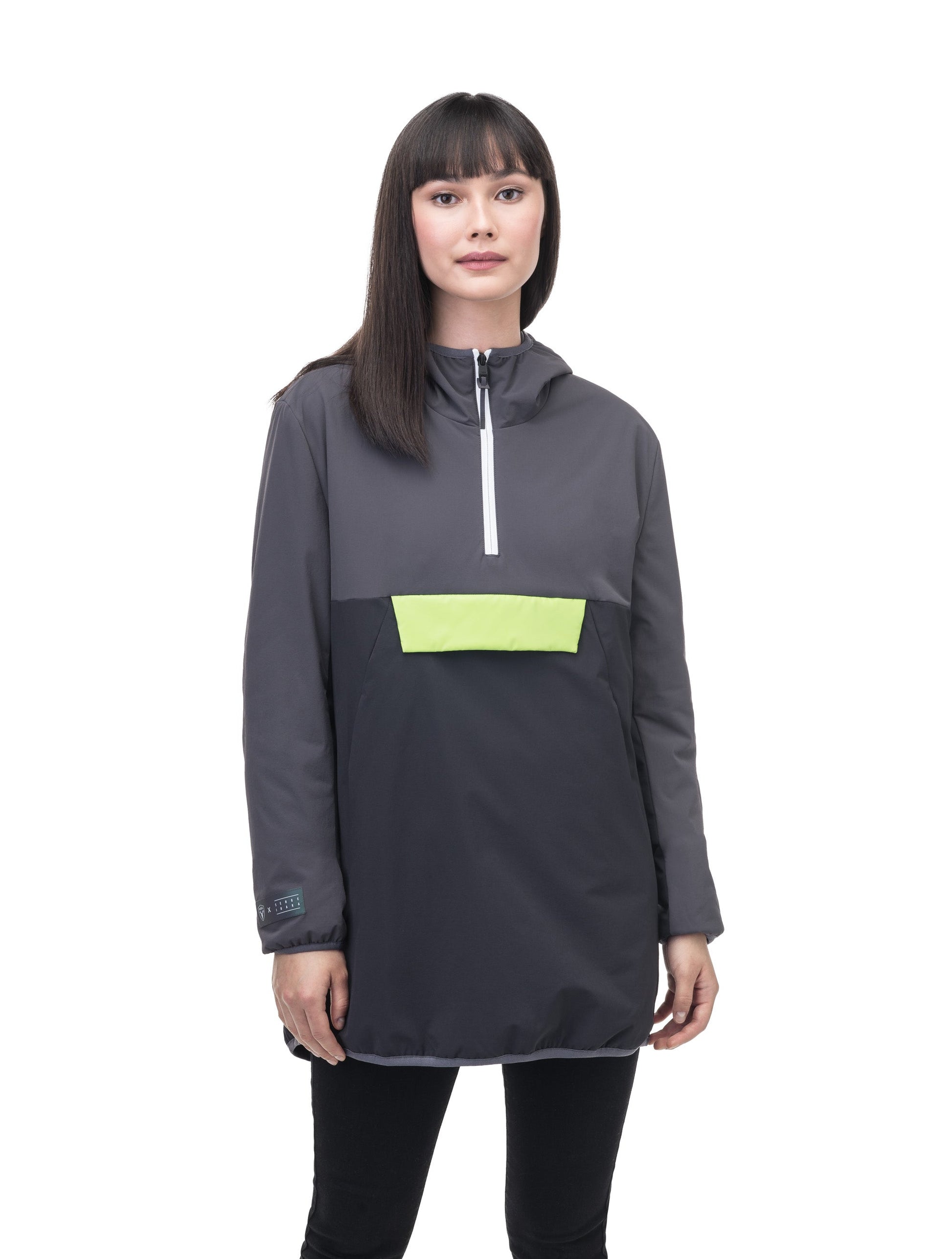 Unisex thigh length hooded anorak with vertical zipper along collar, side zippers along torso, and centre zipper pouch with a reflective flap, in Steel Grey/Black