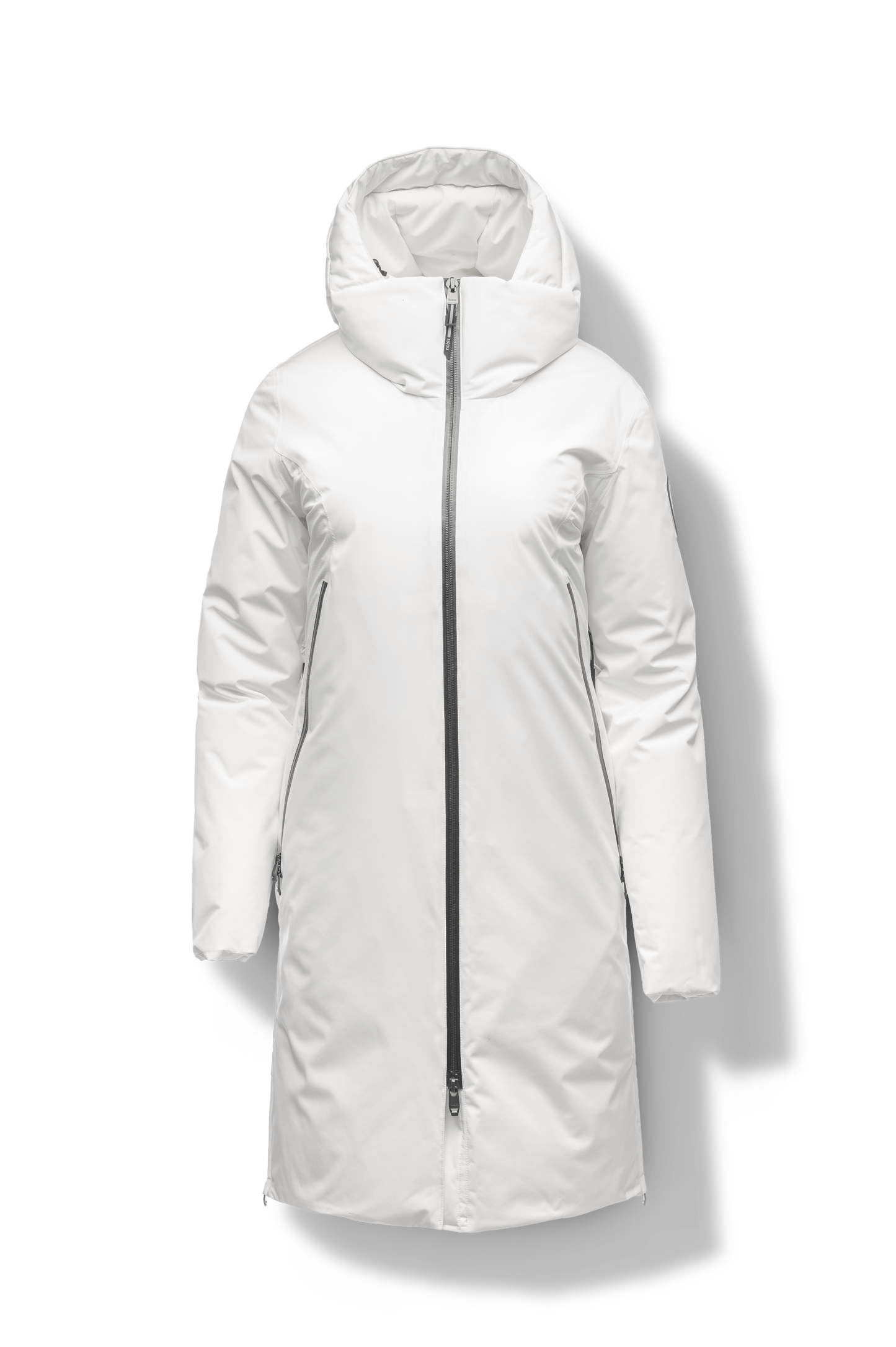 Inara Women's Performance Parka in knee length, premium 3-ply micro denier and stretch ripstop fabrication with DWR coating, Premium Canadian White Duck Down insulation, non-removable down-filled hood, centre front two-way zipper, large vertical zipper pockets along waist, zipper vents along bottom side hem, in Chalk