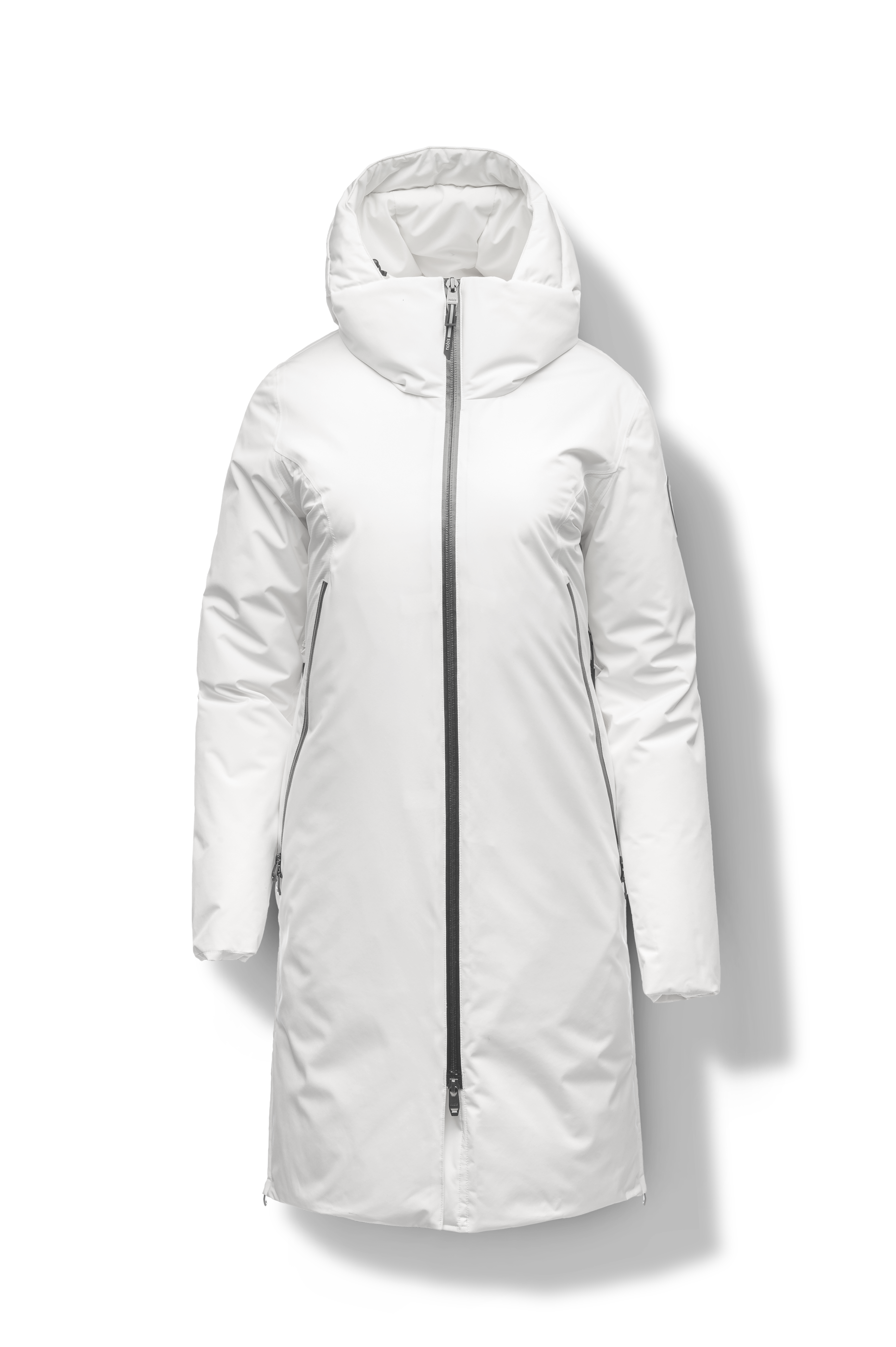 Inara Women's Performance Parka in knee length, premium 3-ply micro denier and stretch ripstop fabrication with DWR coating, Premium Canadian White Duck Down insulation, non-removable down-filled hood, centre front two-way zipper, large vertical zipper pockets along waist, zipper vents along bottom side hem, in Chalk