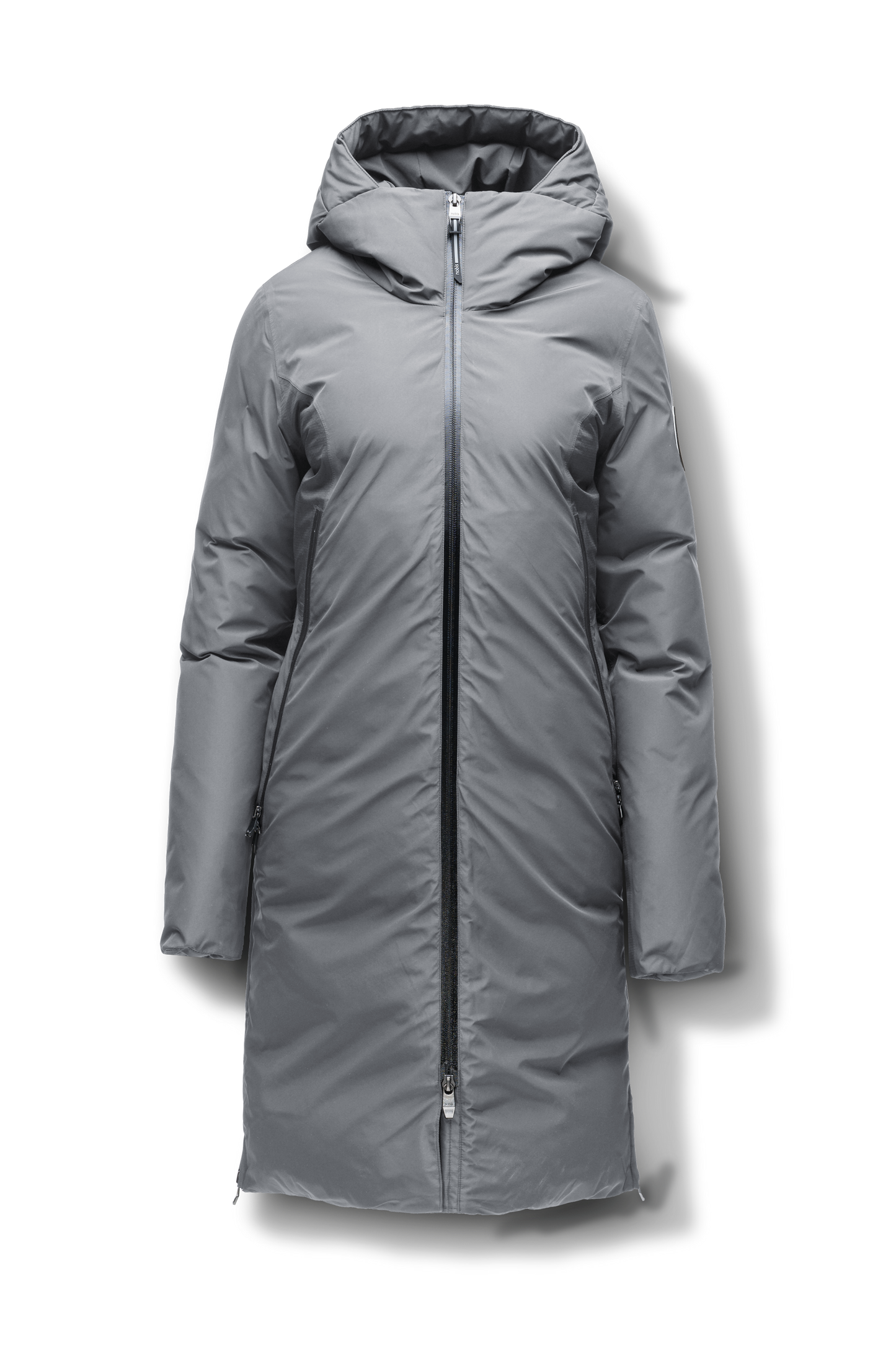 Inara Women's Performance Parka in knee length, premium 3-ply micro denier and stretch ripstop fabrication with DWR coating, Premium Canadian White Duck Down insulation, non-removable down-filled hood, centre front two-way zipper, large vertical zipper pockets along waist, zipper vents along bottom side hem, in Concrete