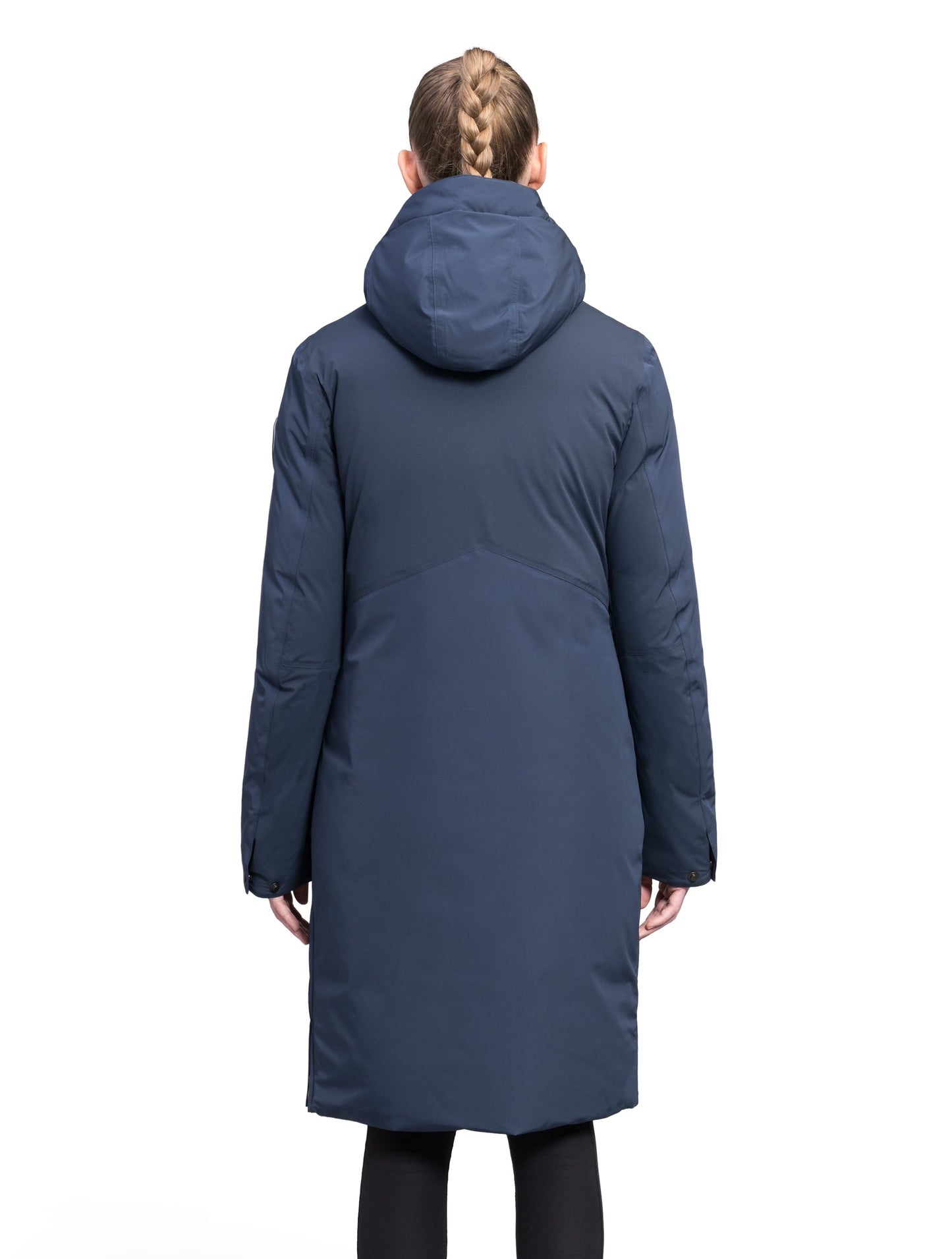 Inara Women's Performance Parka in knee length, premium 3-ply micro denier and stretch ripstop fabrication with DWR coating, Premium Canadian White Duck Down insulation, non-removable down-filled hood, centre front two-way zipper, large vertical zipper pockets along waist, zipper vents along bottom side hem, in Marine