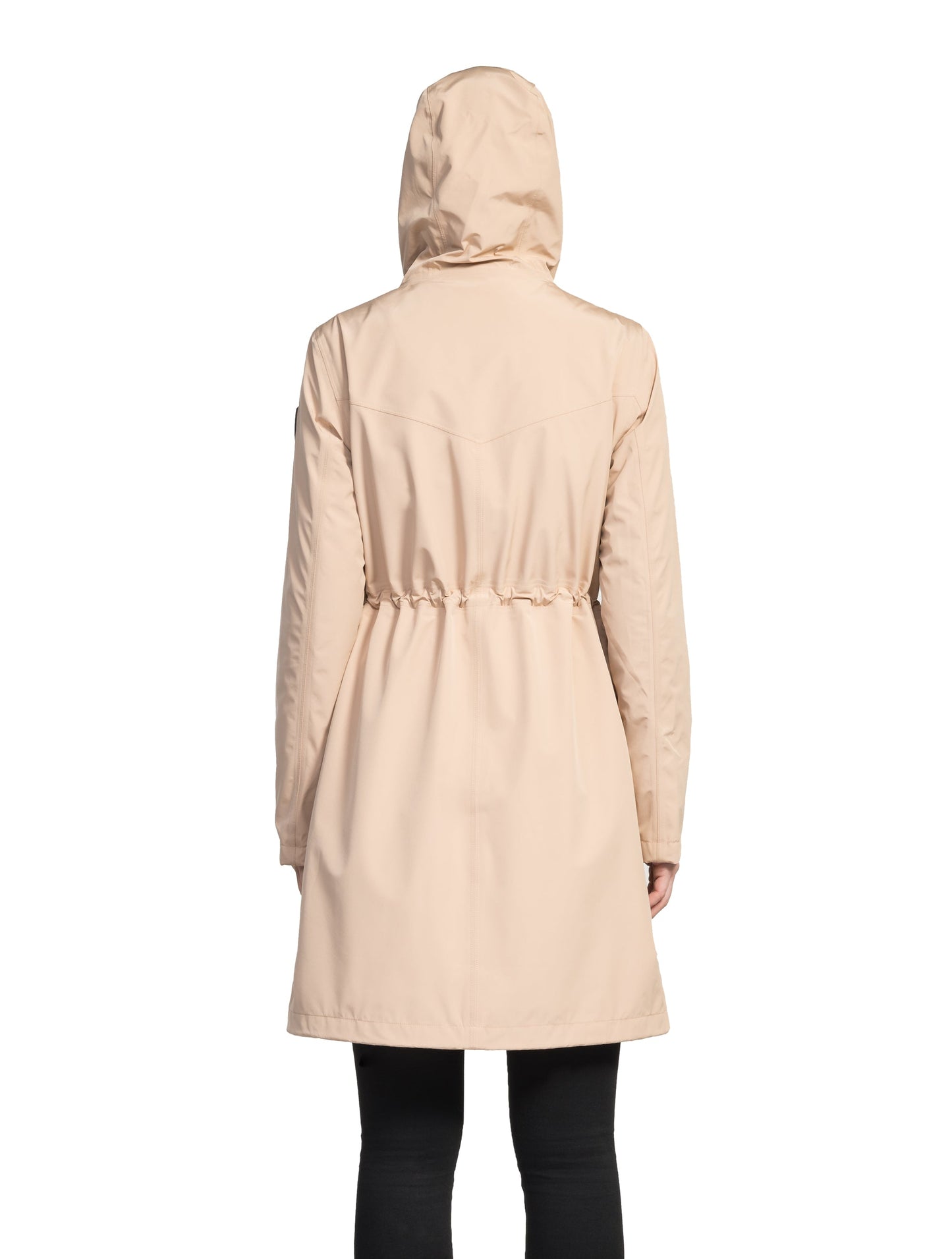 Women's knee length anorak with four front pockets and adjustable cord waist in Fawn