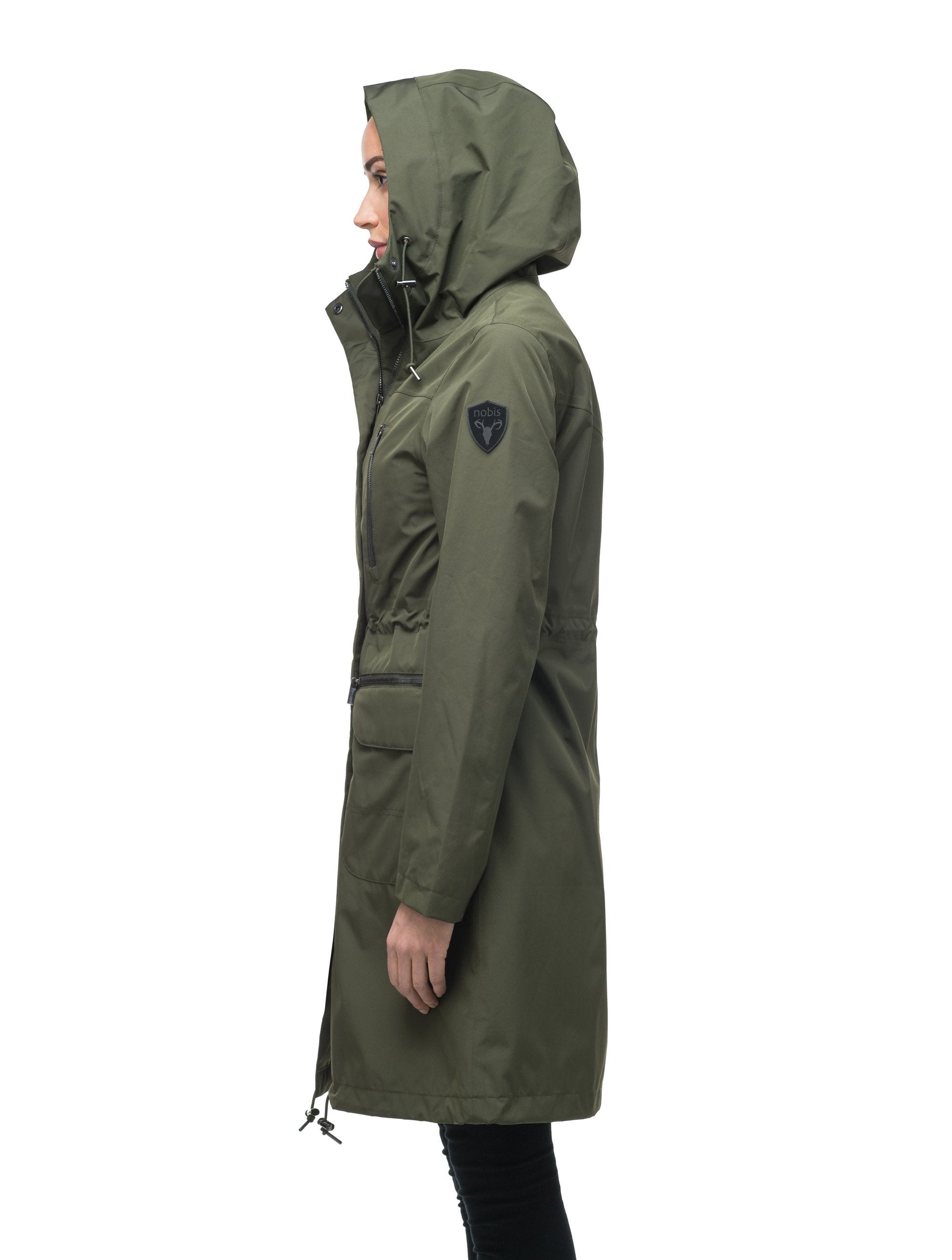 Women's knee length anorak with four front pockets and adjustable cord waist in Fatigue